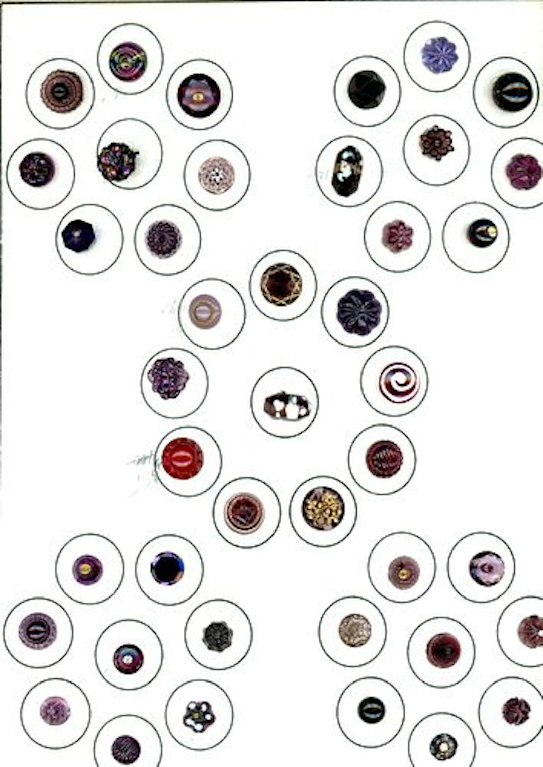 A CARD OF DIVISION ONE CHARMSTRING GLASS BUTTONS