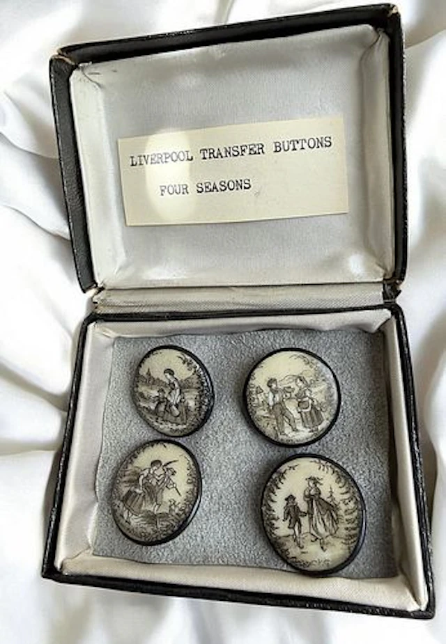 A SET OF DIVISION ONE PICTORIAL CERAMIC BUTTONS