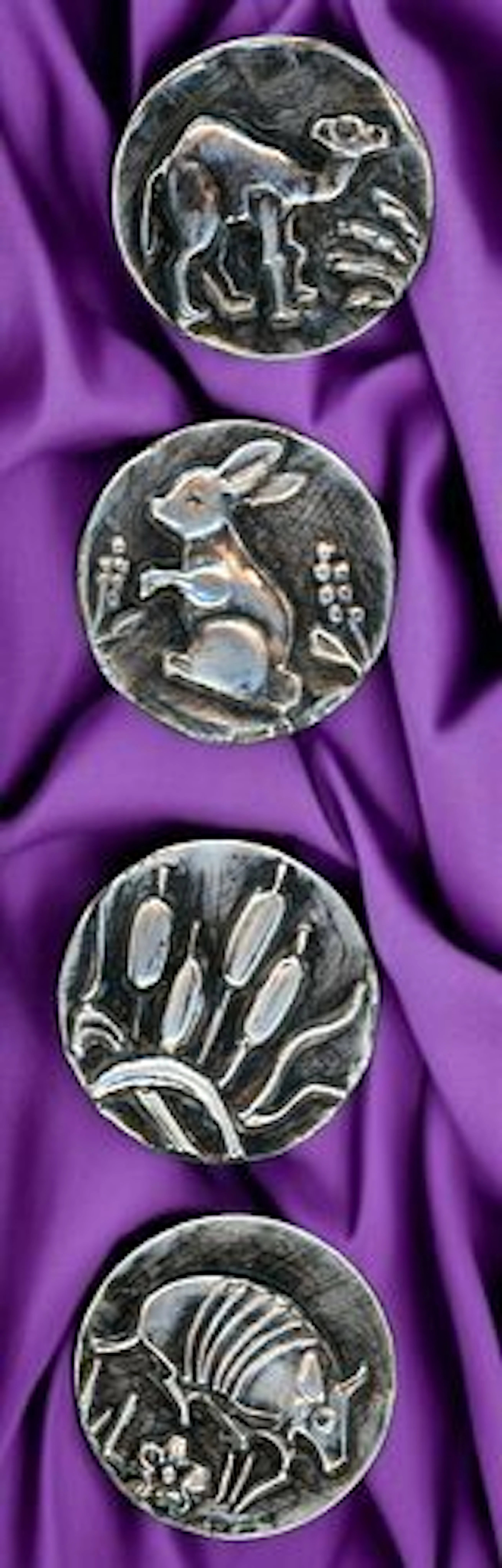 A SMALL CARD OF DIVISION THREE STUDIO ARTIST BUTTONS