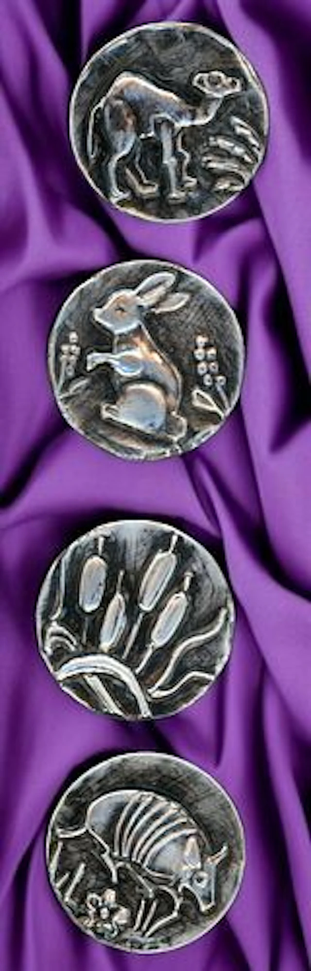 A SMALL CARD OF DIVISION THREE STUDIO ARTIST BUTTONS