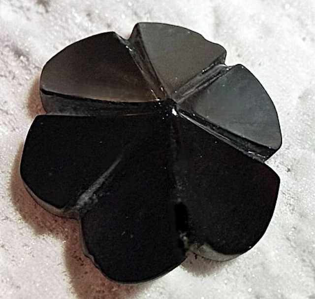 A DIVISION ONE GEMSTOME SHAPE BUTTON