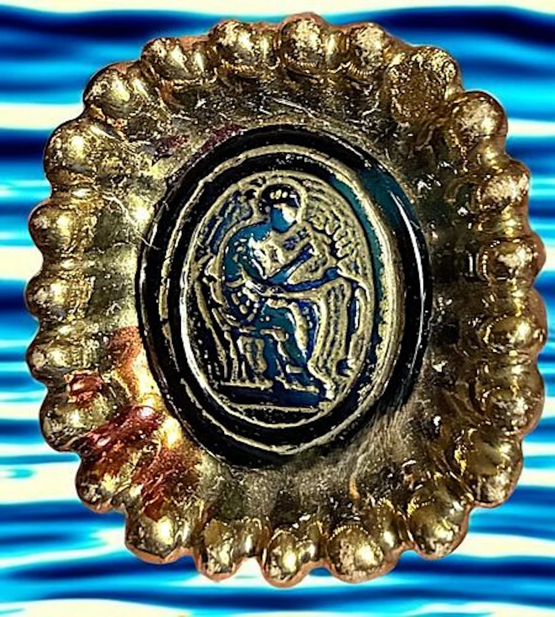 A DIVISION THREE GLASS AND POTTERY BUTTON
