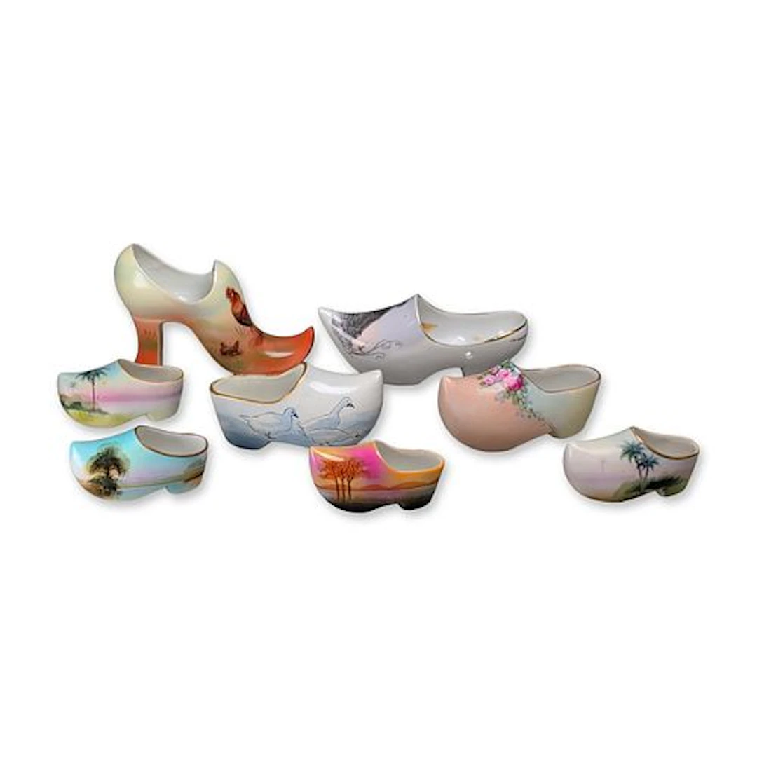 8pc Collection of Hand Painted Porcelain Shoe and Clog Figurines