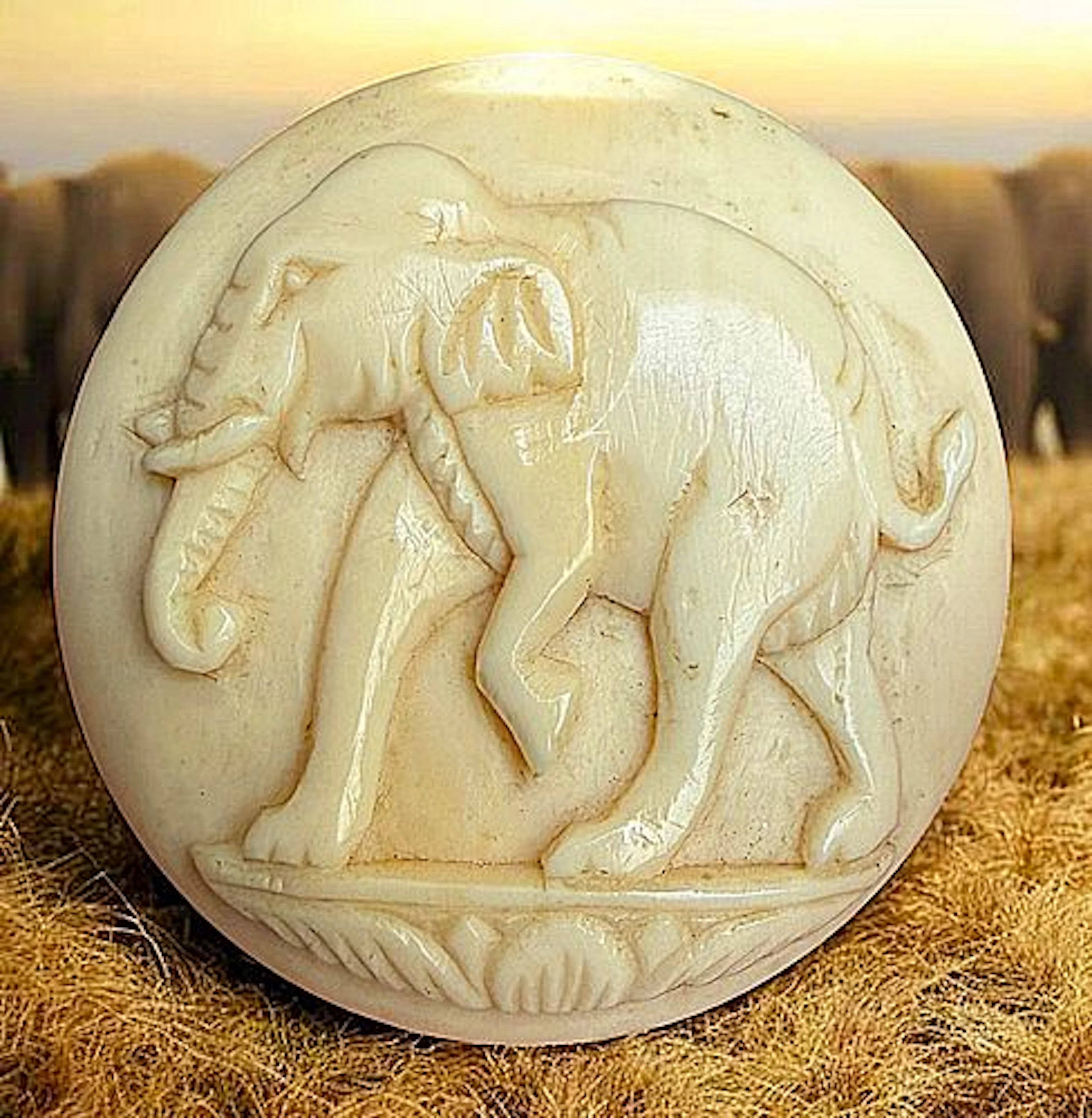 A DIVISION ONE CARVED FULL BODY ELEPHANT