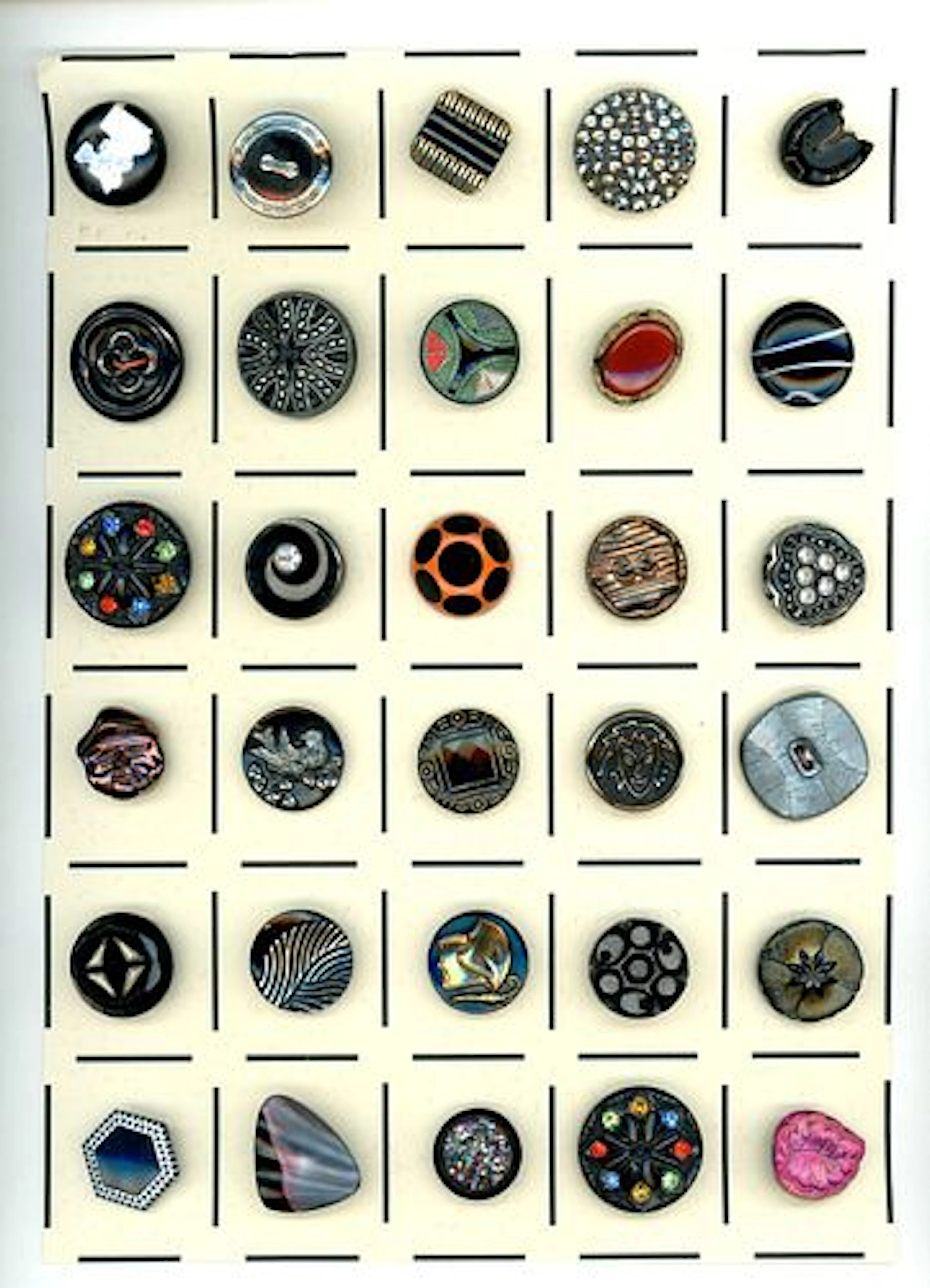 A CARD OF DIVISION THREE ASSORTED BLACK GLASS BUTTONS