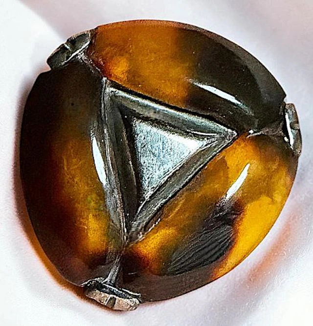 A DIVISION ONE MEXICAN SHELL AND SILVER BUTTON