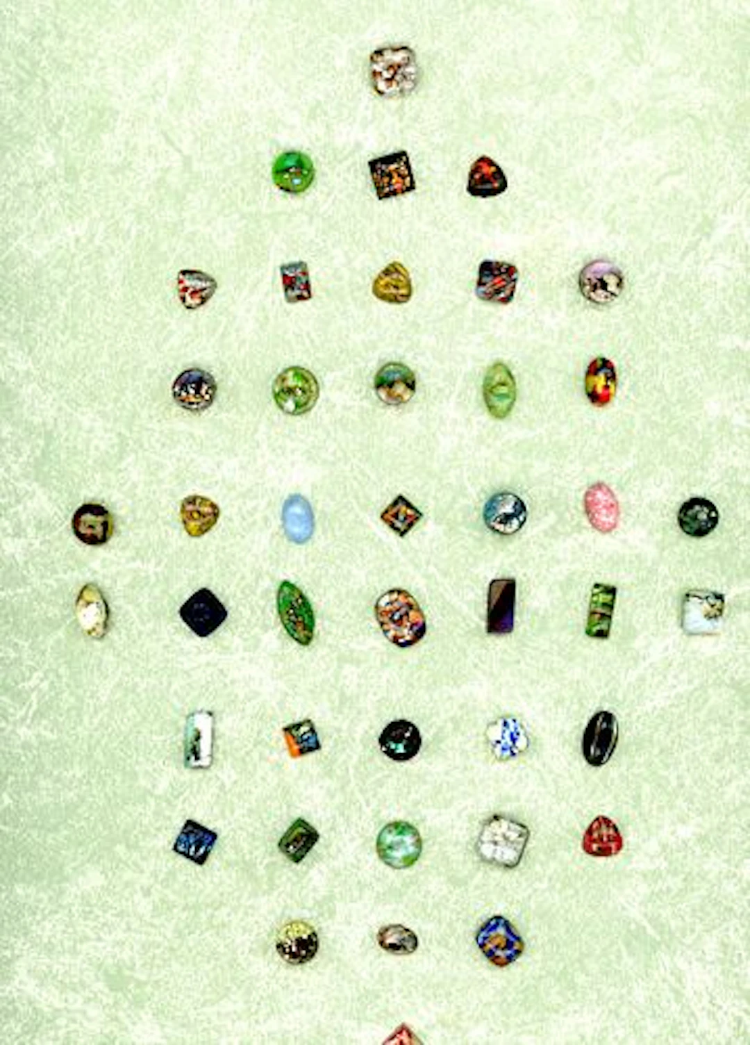 A CARD OF DIVISION ONE POPPER GLASS BUTTONS