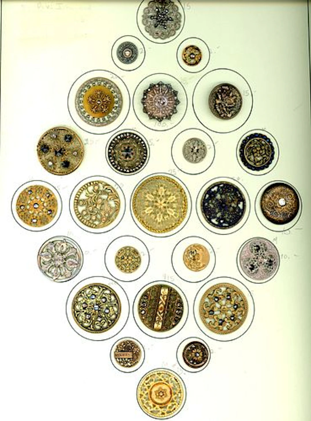 A CARD OF DIVISION ONE PIERCED METAL BUTTONS