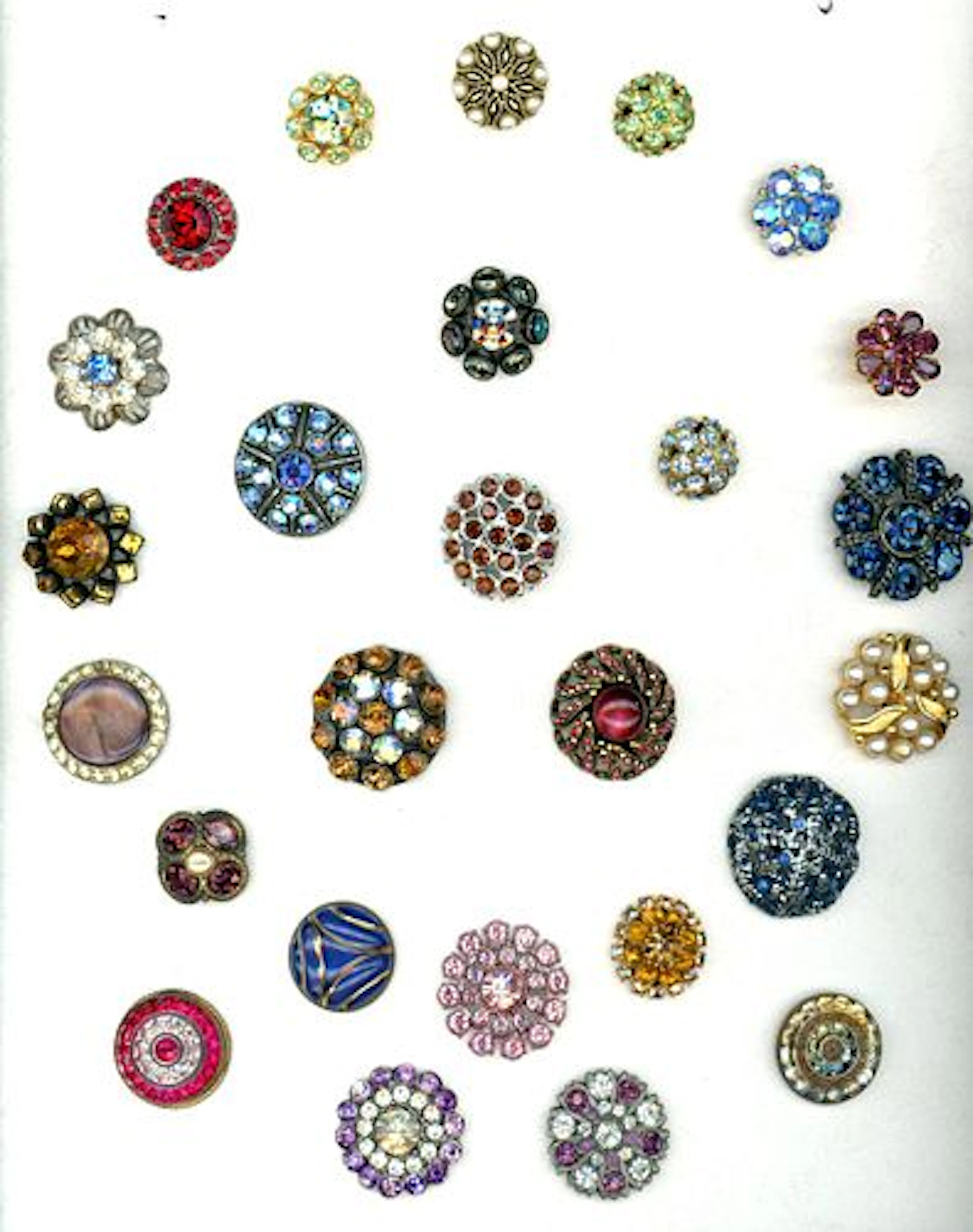 A CARD OF DIVISION ONE AND THREE JEWELED BUTTONS