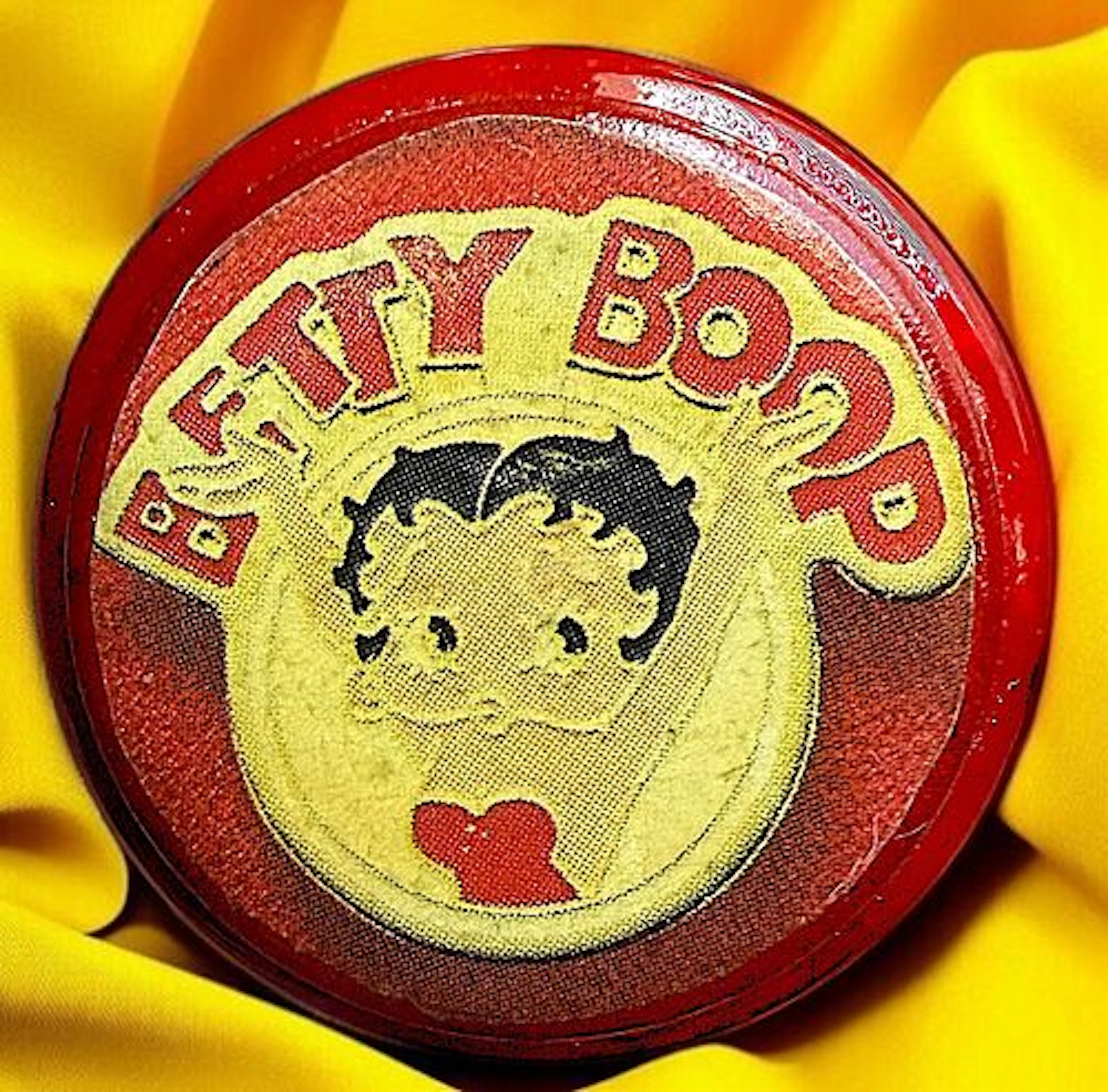 A DIVISION THREE STUDIO ARTIST BUTTON
