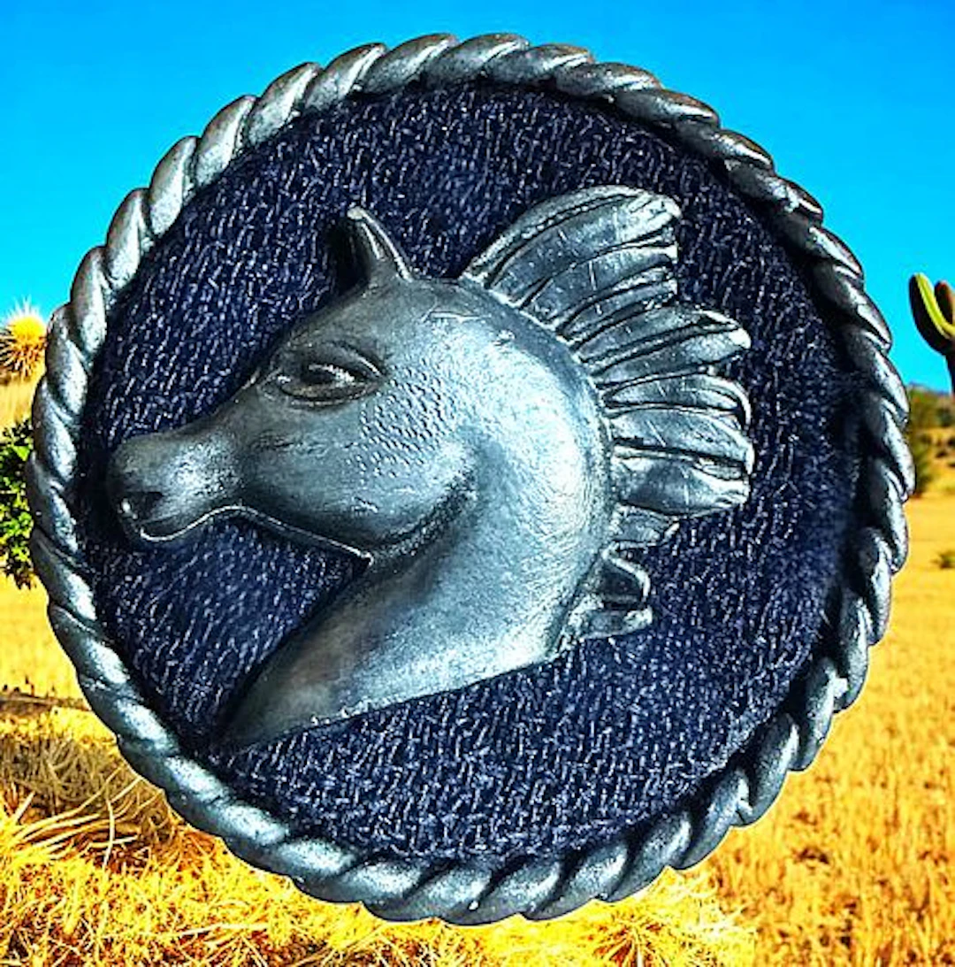 A DIVISION THREE PICTORIAL HORSE BUTTON