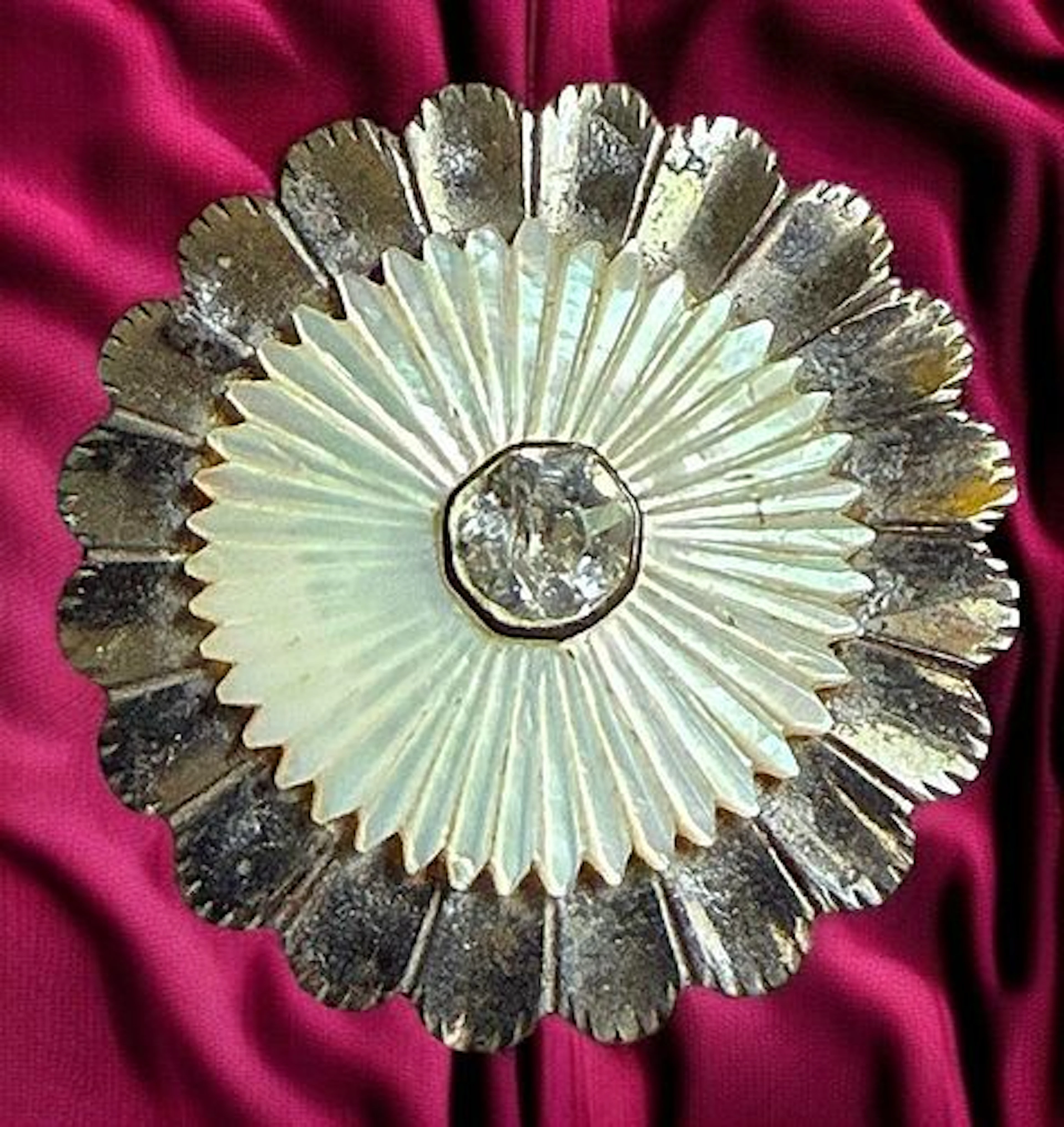 A DIVISION ONE STEEL AND PEARL BUTTON
