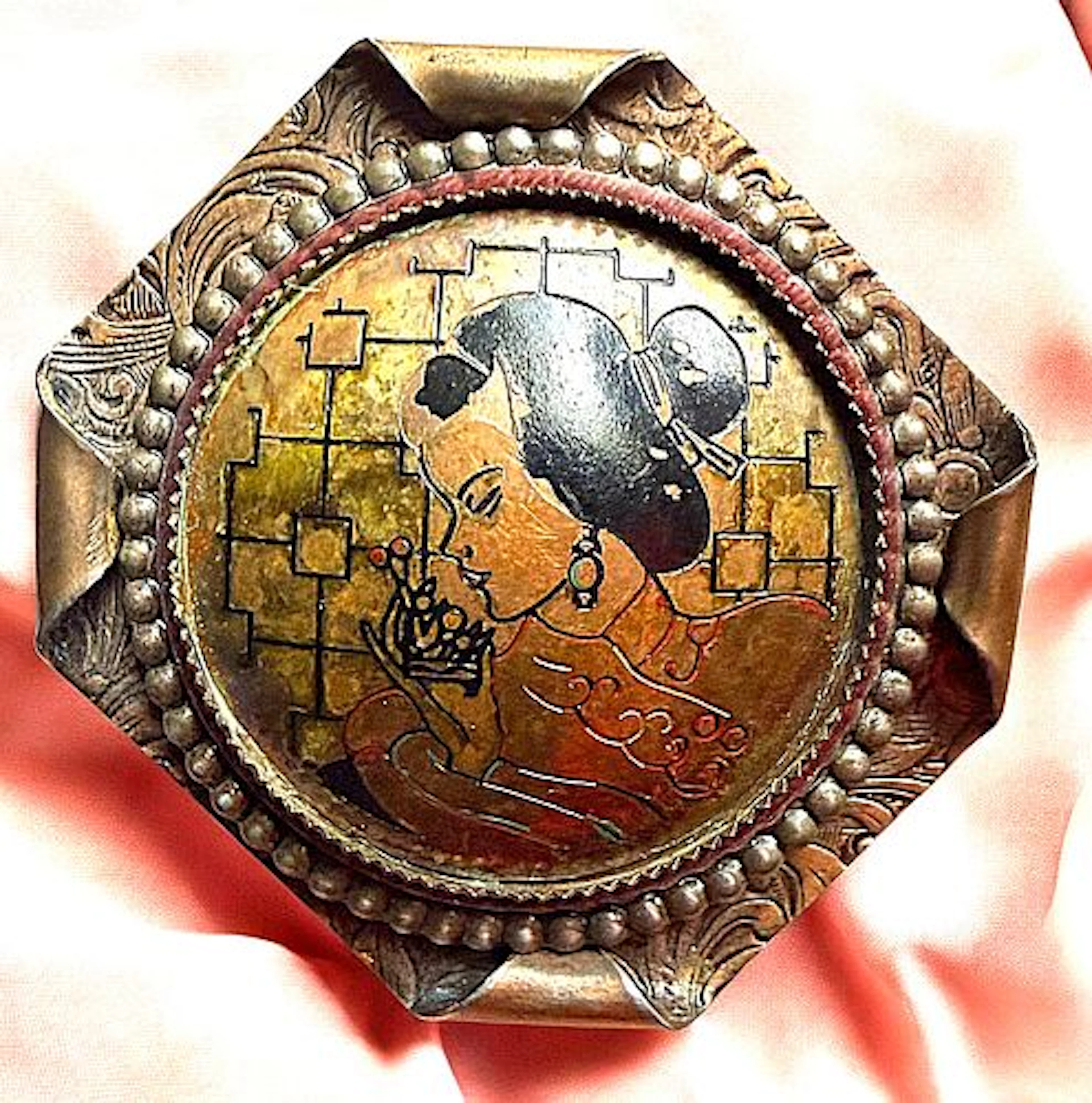 A DIVISION THREE HANDKERCHIEF CORNER BUTTON