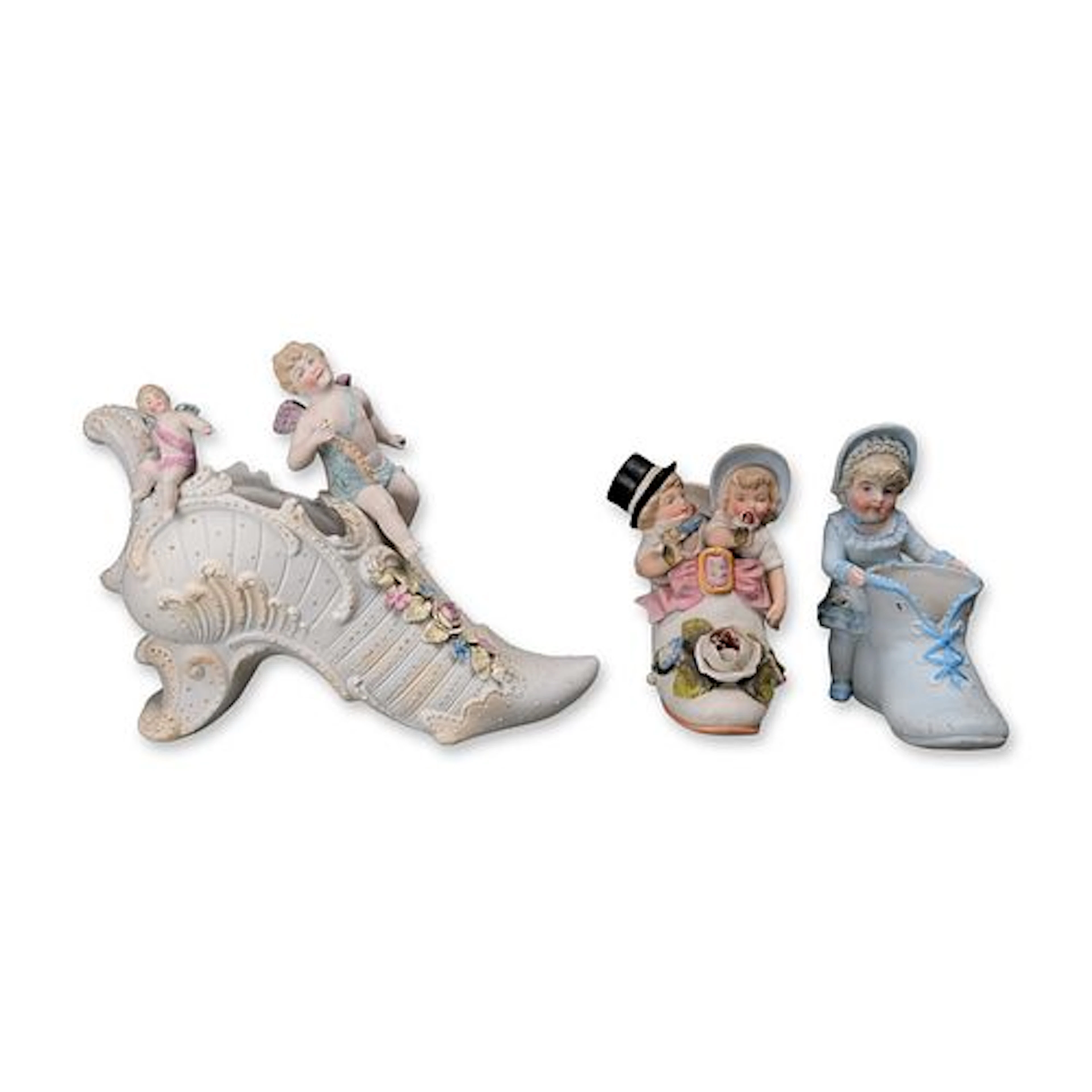Group of Three Bisque Porcelain Shoe Figurines