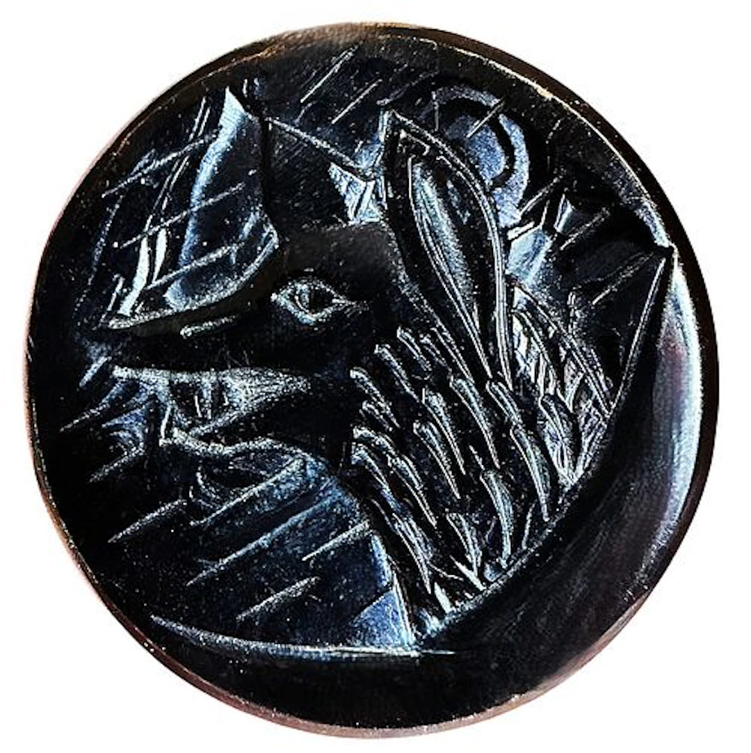 A DIVISION ONE CASEIN ANIMAL BUTTON