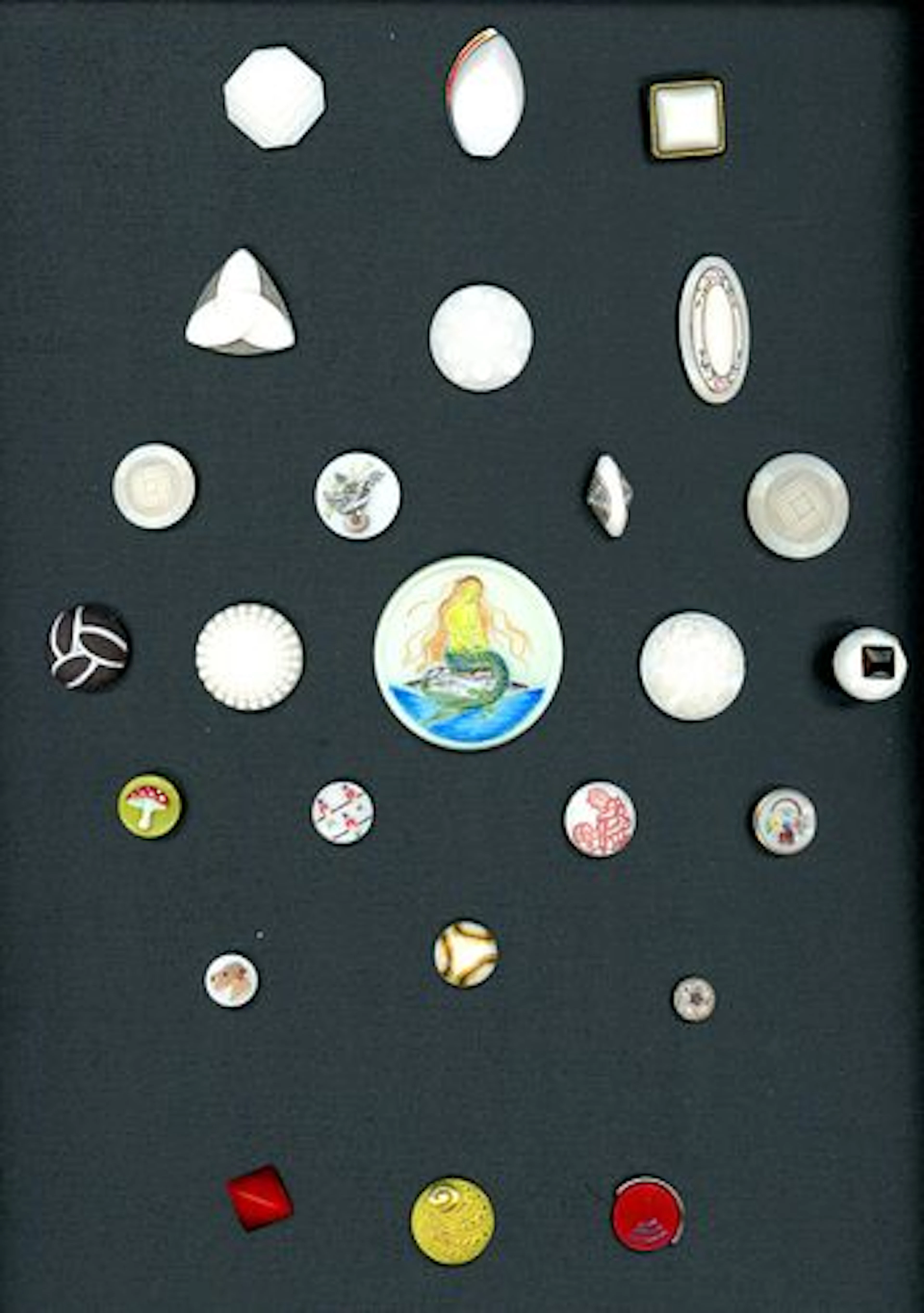 A SPECIAL CARD OF DIVISION 3 MOSTLY WHITE GLASS BUTTONS