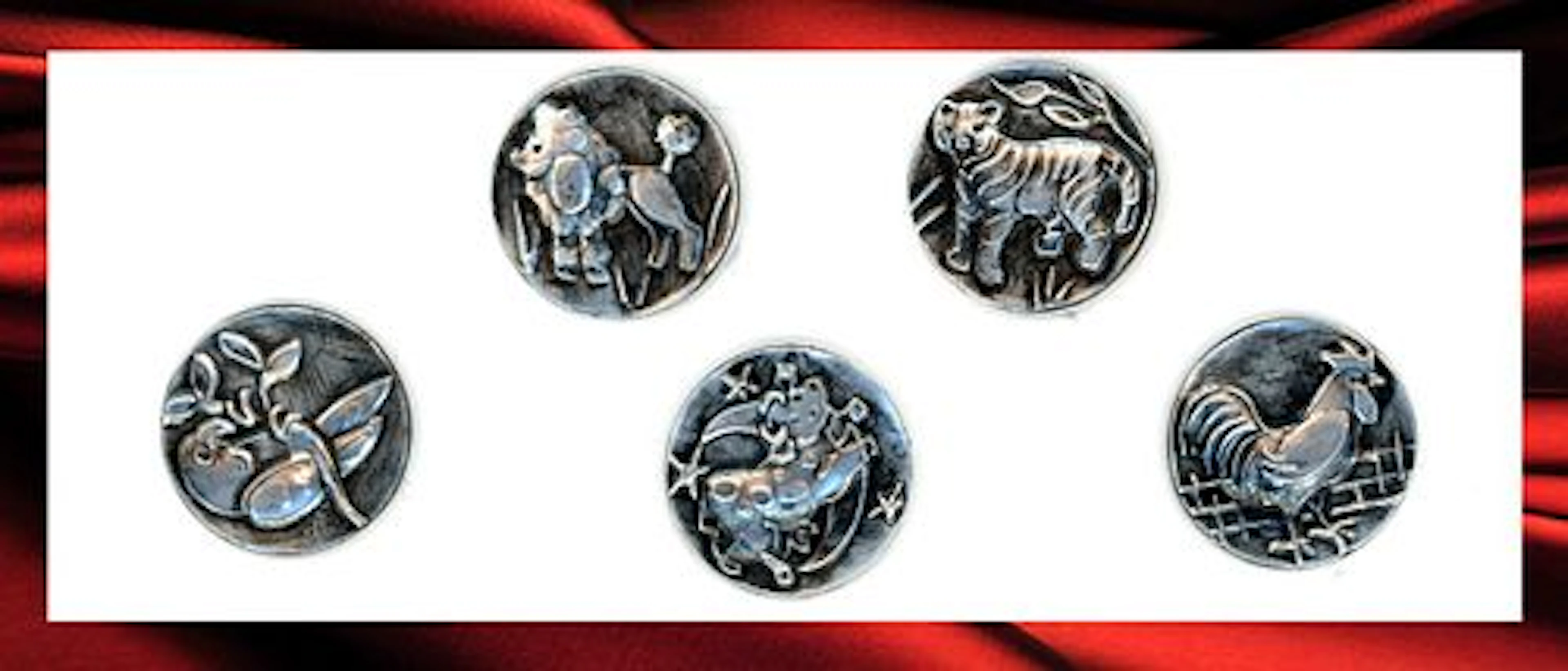 A SMALL CARD OF DIVISION THREE PICTORIAL BUTTONS