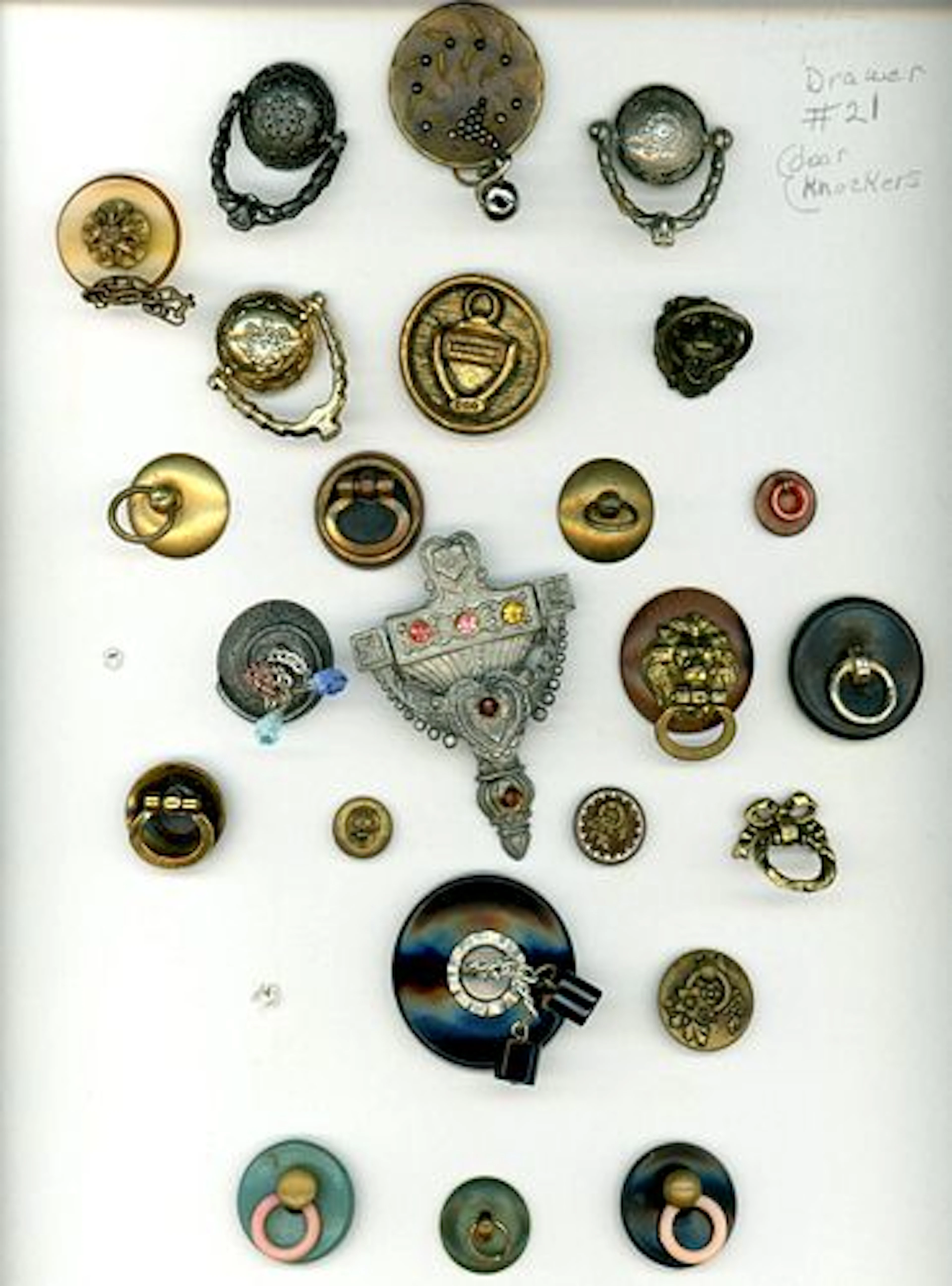A CARD OF DIVISION ONE AND THREE MOVEABLE BUTTONS