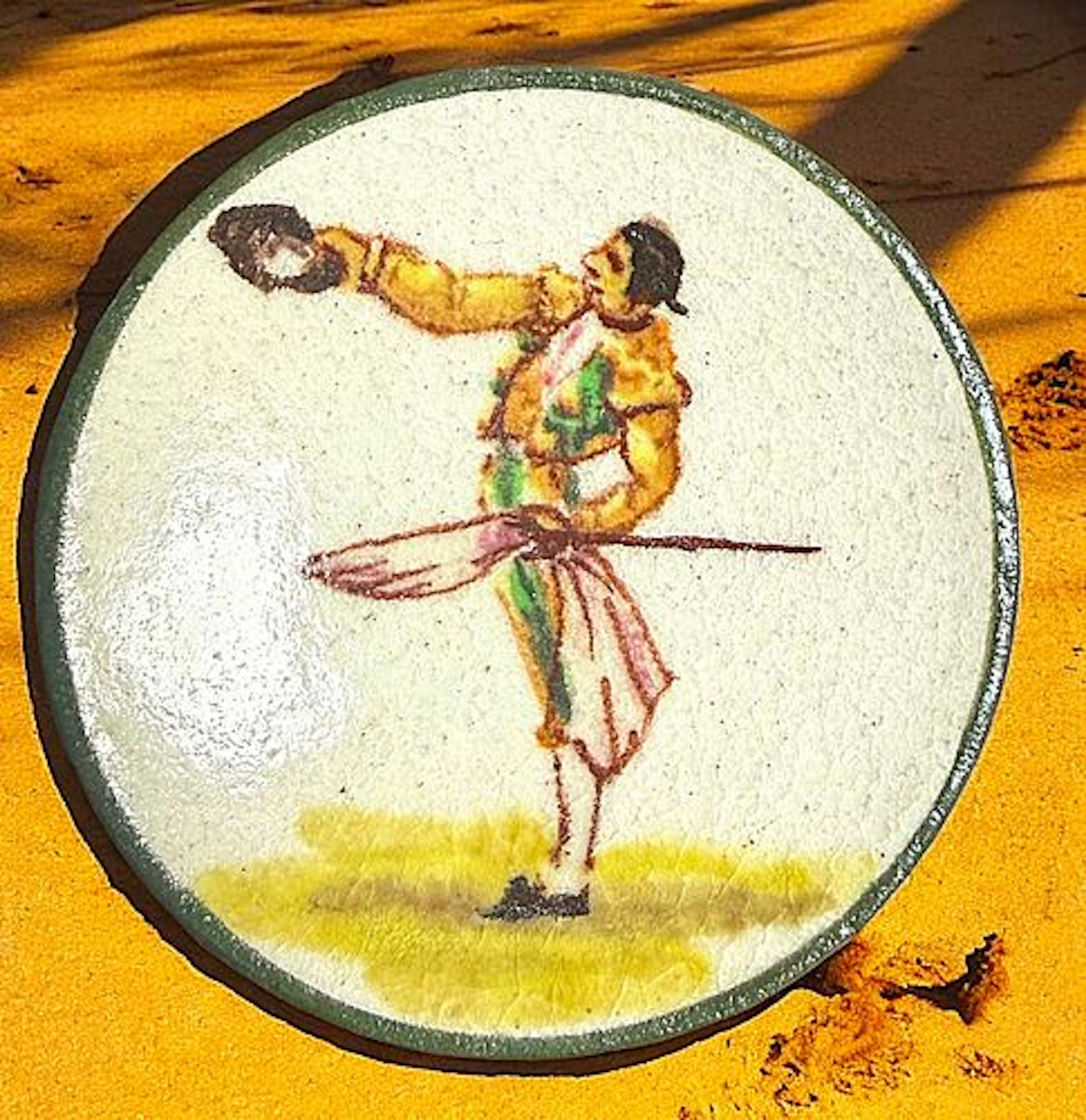 A DIVISION THREE HAND PAINTED CERAMIC BUTTON