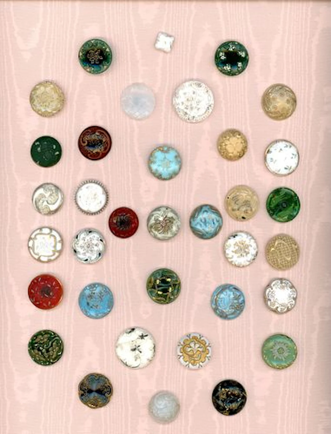 A CARD OF DIVISION ONE VICTORIAN GLASS BUTTONS