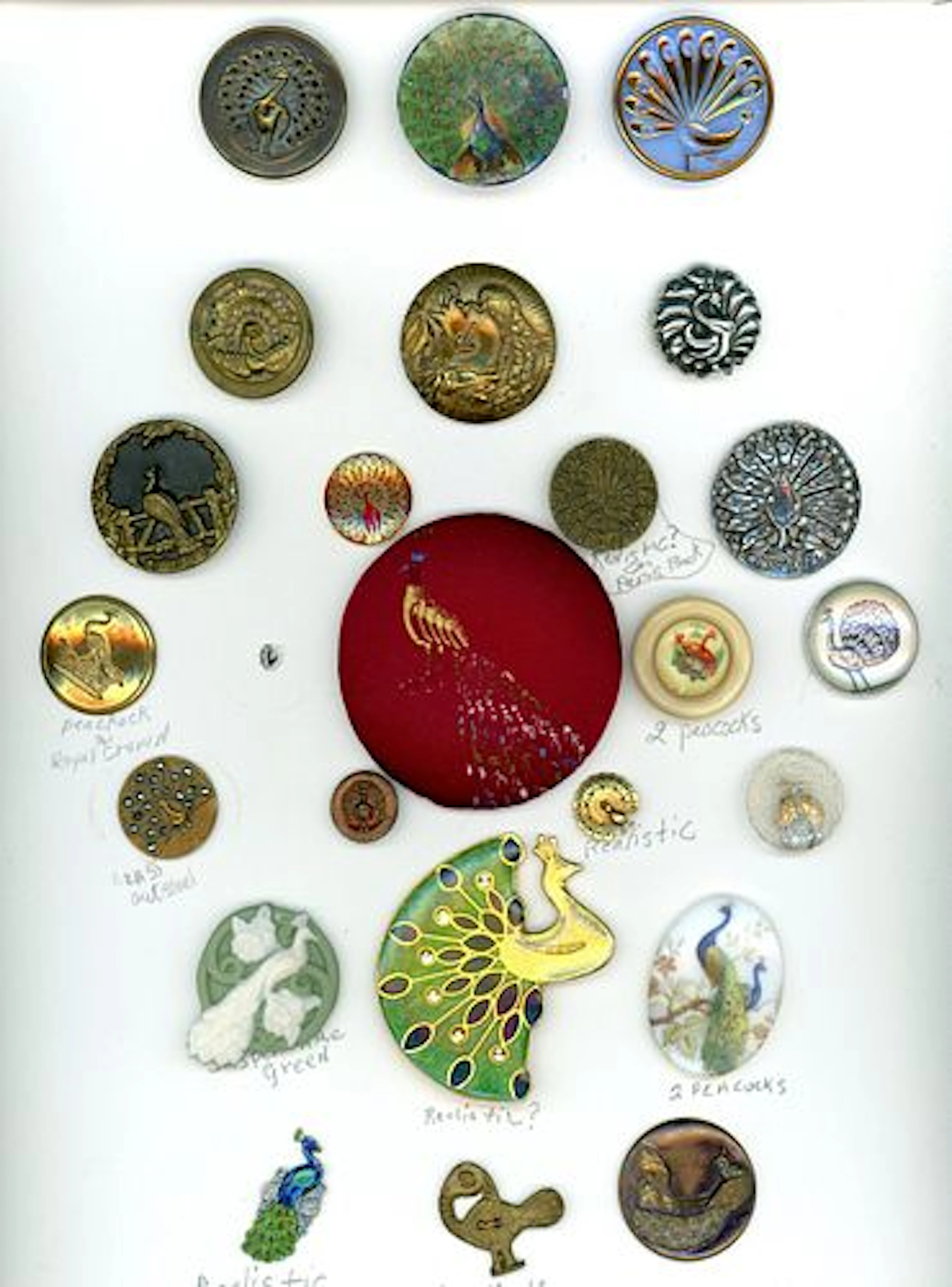 A CARD OF DIVISION ONE AND THREE PEACOCK BUTTONS