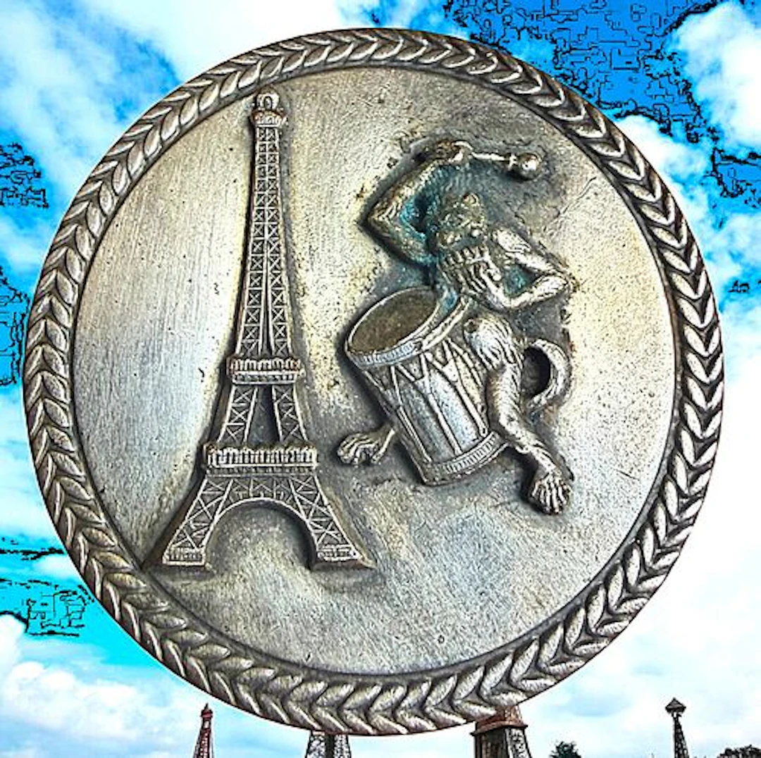 A DIVISION THREE METAL PICTORIAL BUTTON