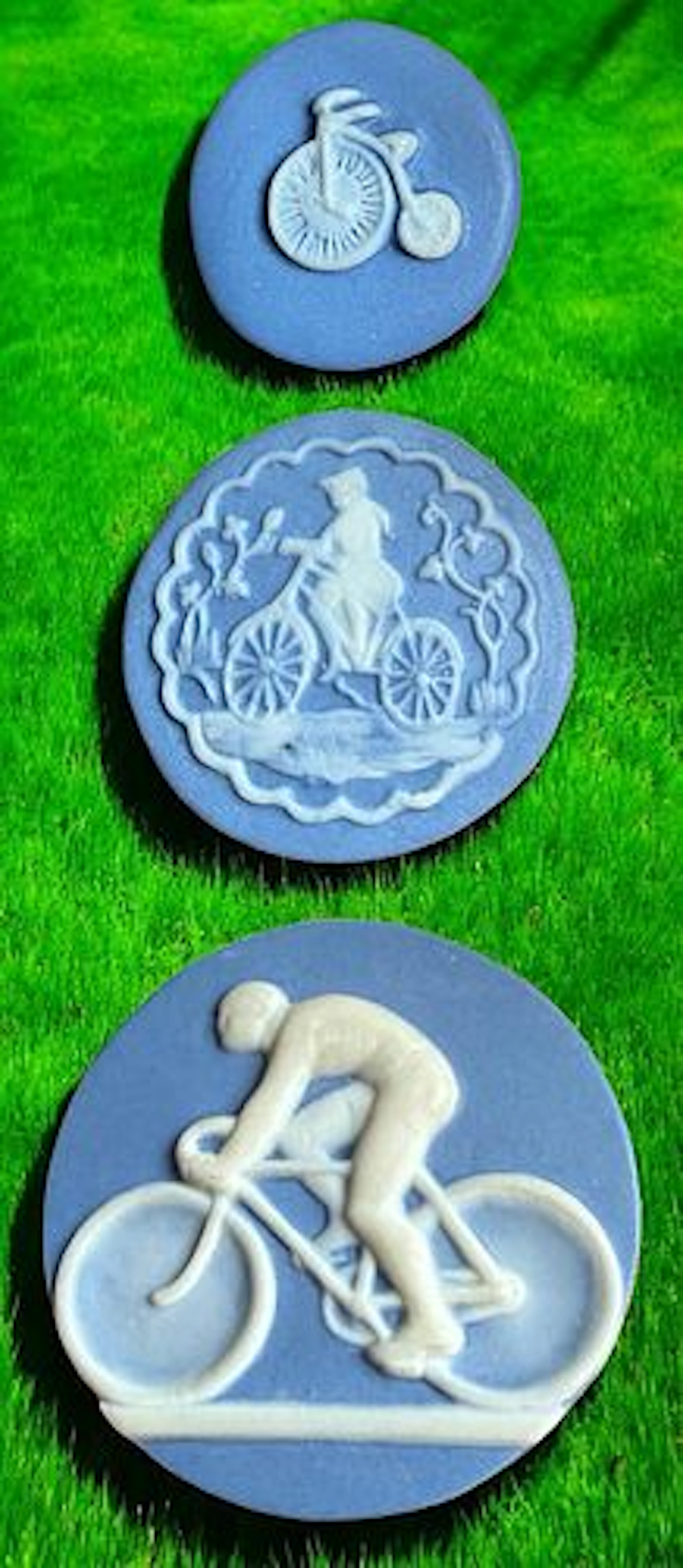 A SMALL CARD OF DIVISION THREE STUDIO BUTTONS