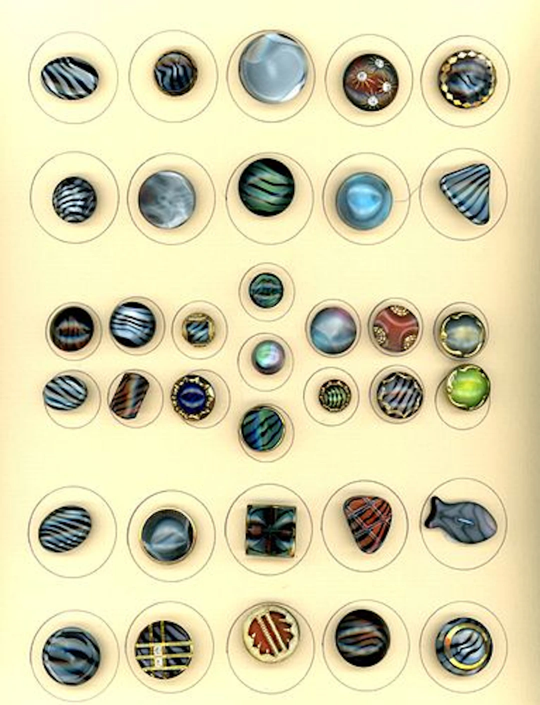 A CARD OF DIVISION THREE SPECIALIZED GLASS BUTTONS