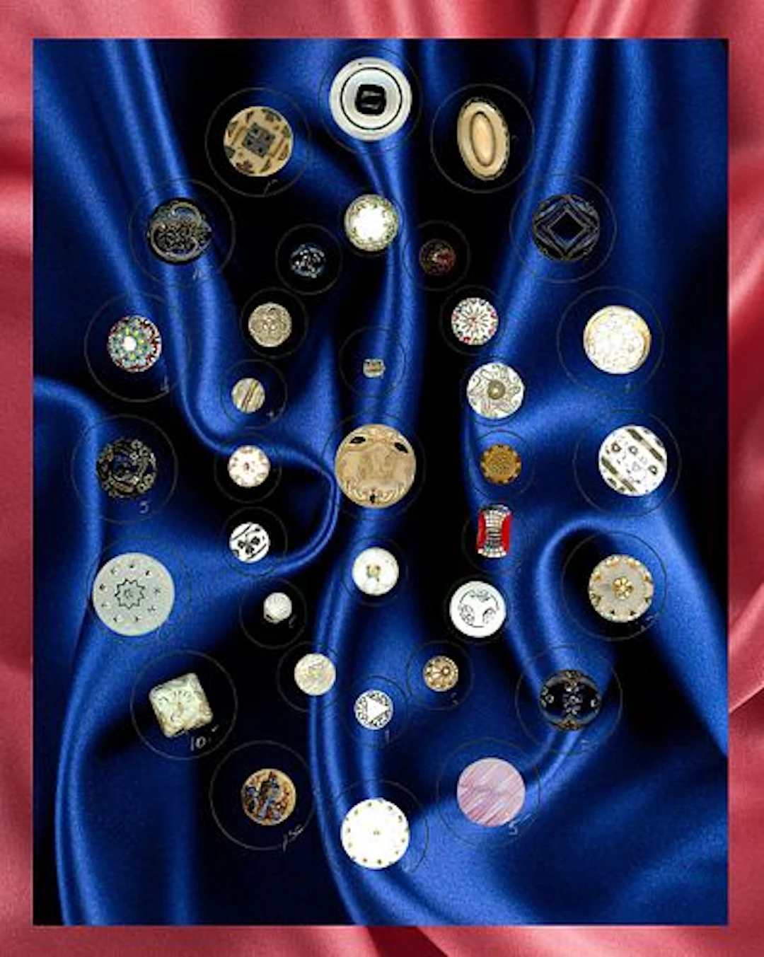 A CARD OF DIVISION ONE ASSORTED GLASS BUTTONS