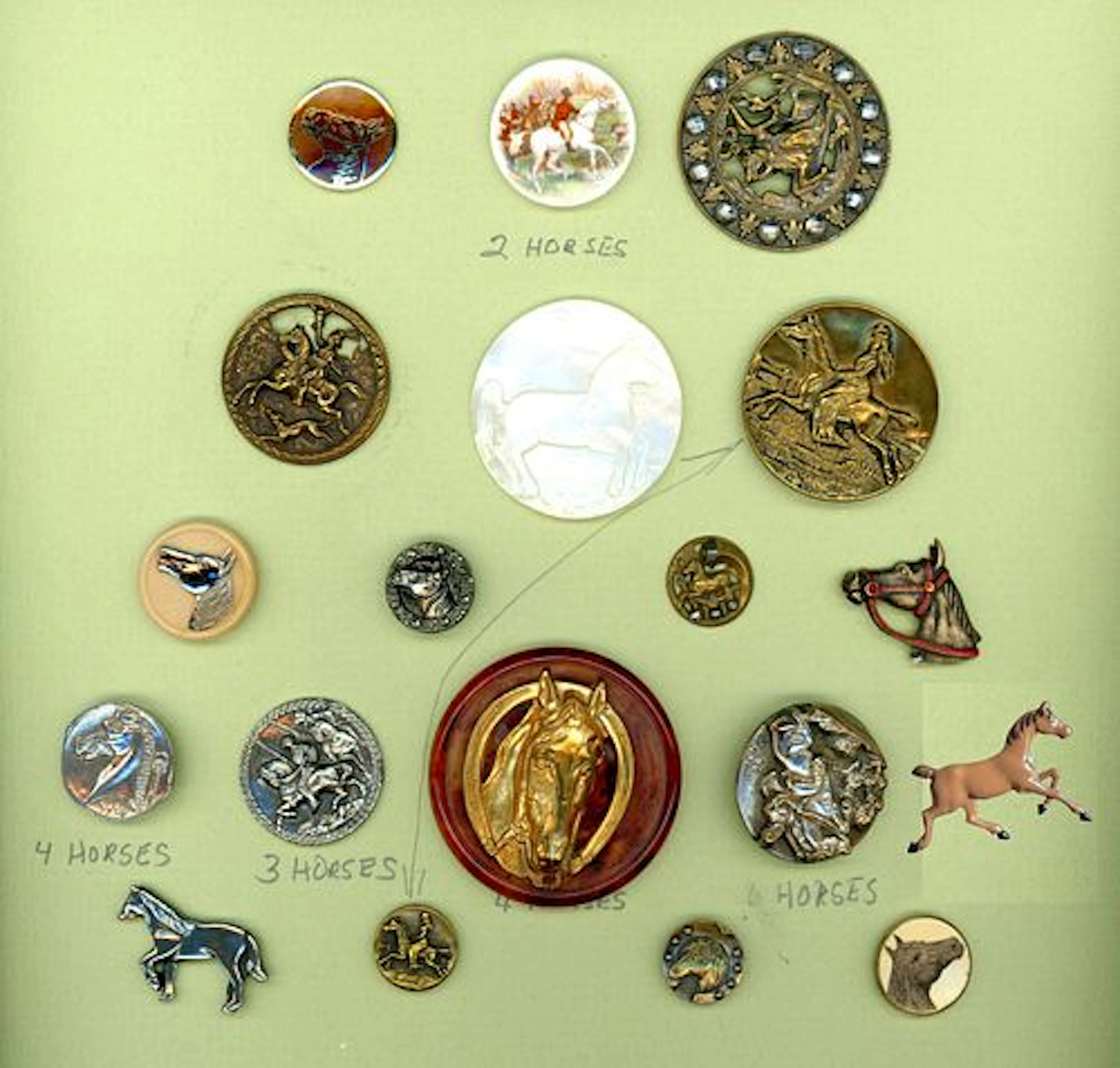 A CARD OF DIVISION ONE AND THREE HORSE BUTTONS