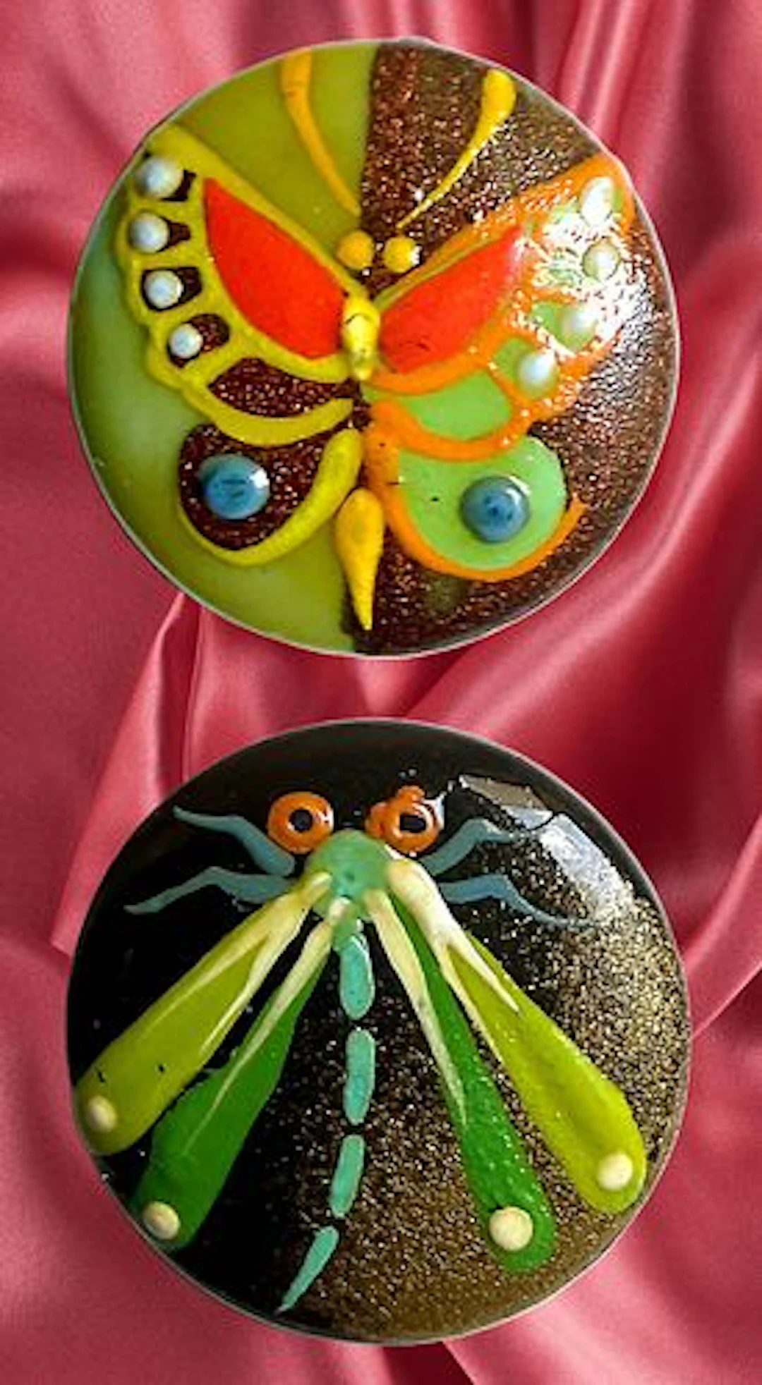 A SMALL CARD OF HAND PAINTED CASEIN PICTORIAL BUTTONS