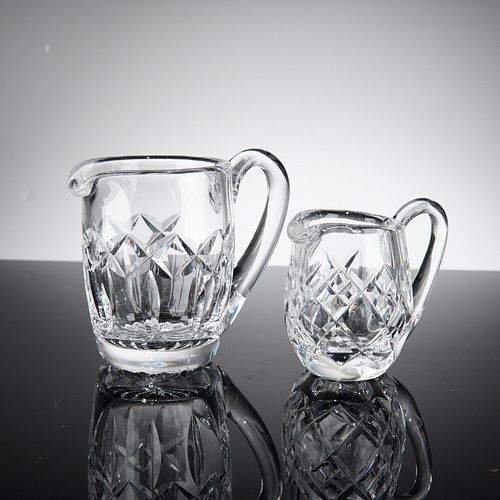 A Pair of Cut Lead Crystal Graduated Creamers, Attributed to Waterford