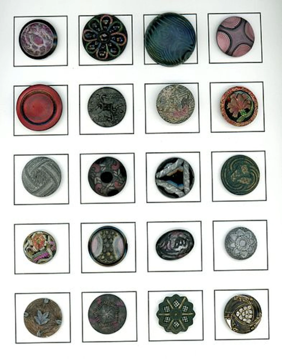 A CARD OF DIVISION ONE BLACK GLASS BUTTONS