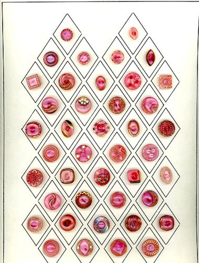 A CARD OF 1940'S WEST GERMAN GLASS MOONGLOW BUTTONS