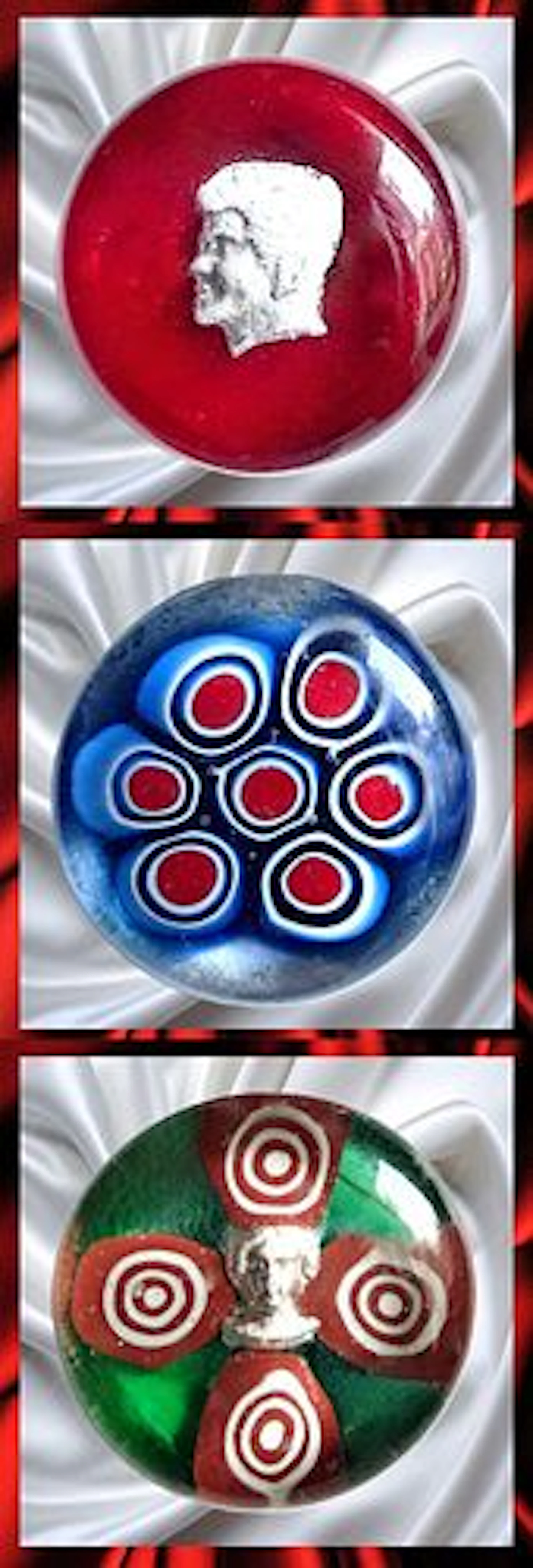 A SMALL CARD OF DIVISION THREE PAPERWEIGHT BUTTONS