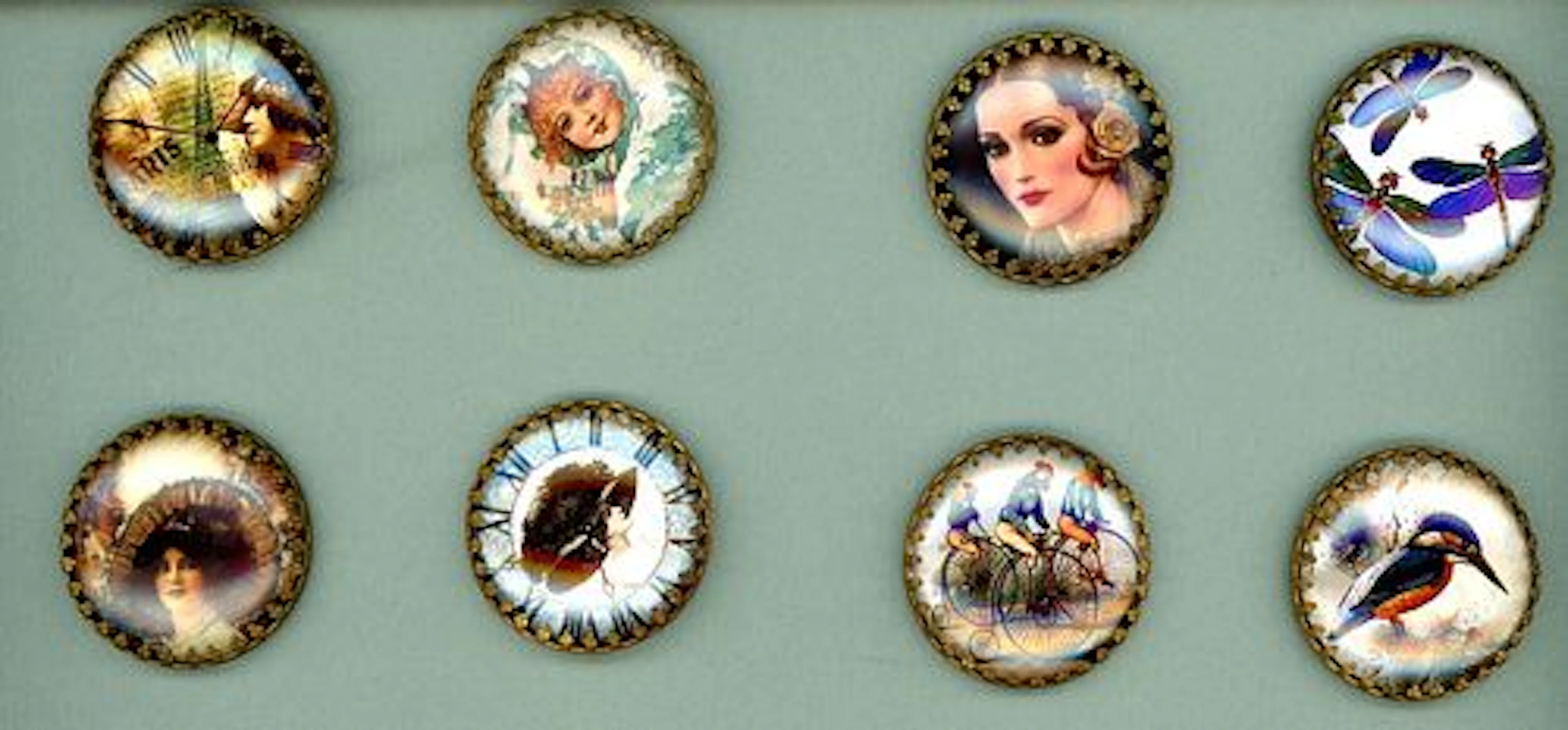 A SMALL CARD OF DIVISION THREE GLASS IN METAL BUTTONS