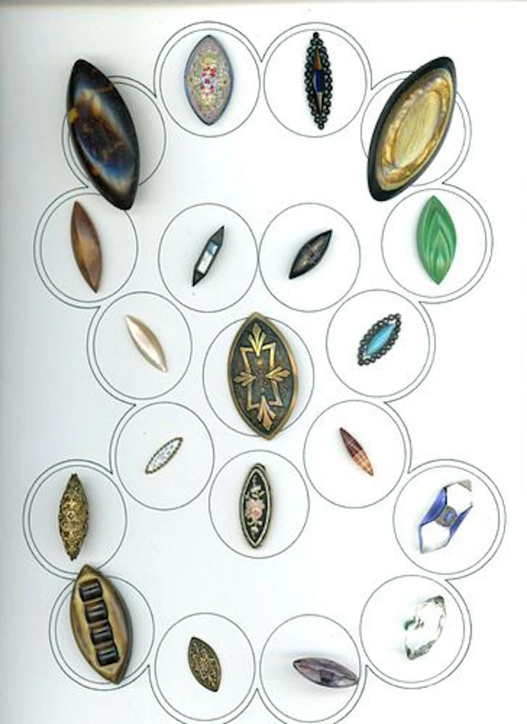 A CARD OF DIVISION INE AND THREE SPINDLE BUTTONS