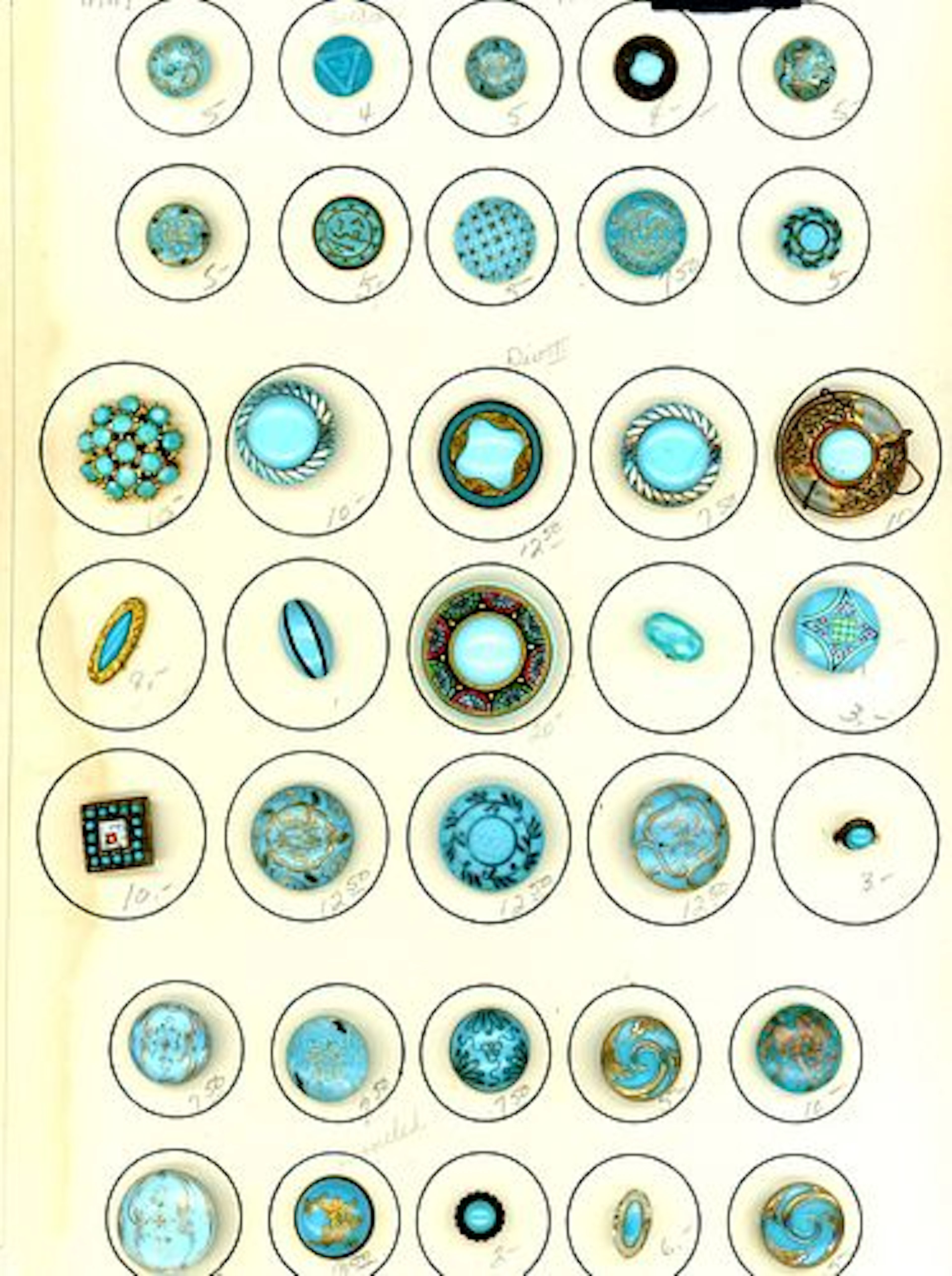 A CARD OF DIVISION ONE GLASS AND GLASS IN METAL BUTTONS