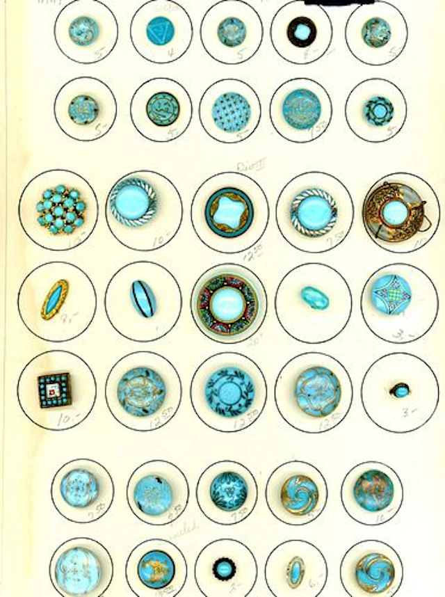 A CARD OF DIVISION ONE GLASS AND GLASS IN METAL BUTTONS