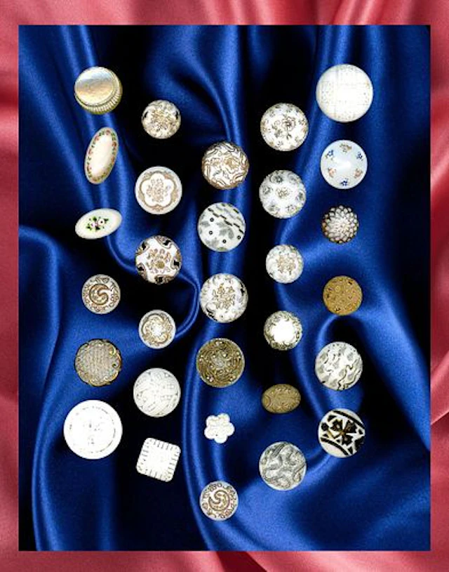 A CARD OF DIVISION ONE VICTORIAN GLASS BUTTONS