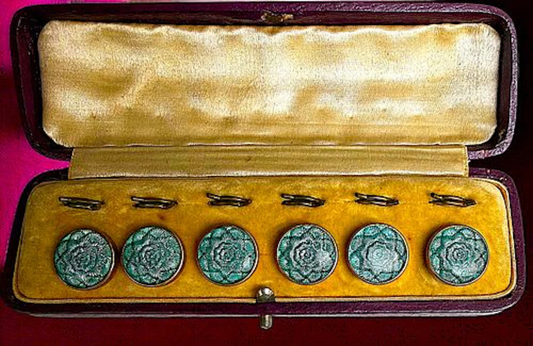 A BOXED SET OF DIVISION ONE ENAMEL BUTTONS