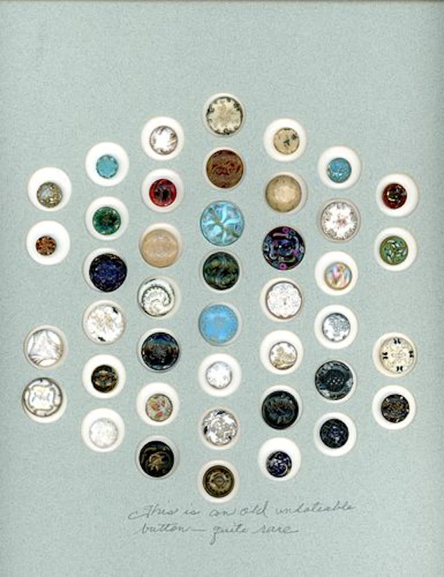 A CARD OF DIVISION ONE VICTORIAN GLASS BUTTONS