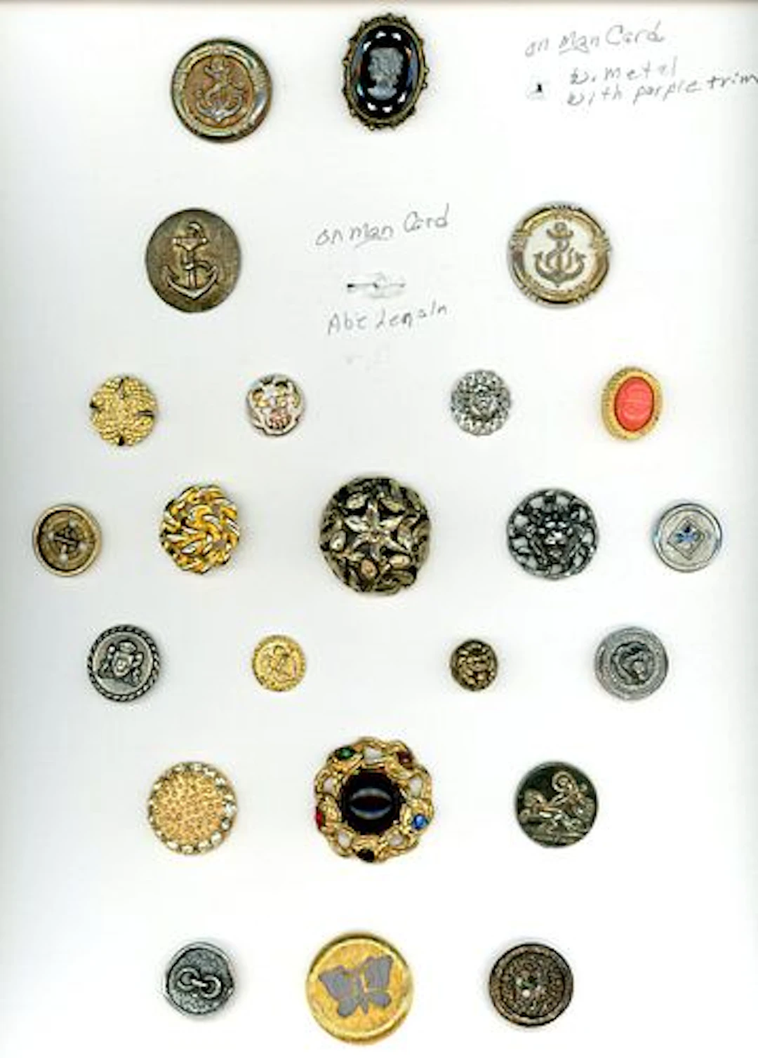A CARD OF DIVISION THREE LIDZ BUTTONS