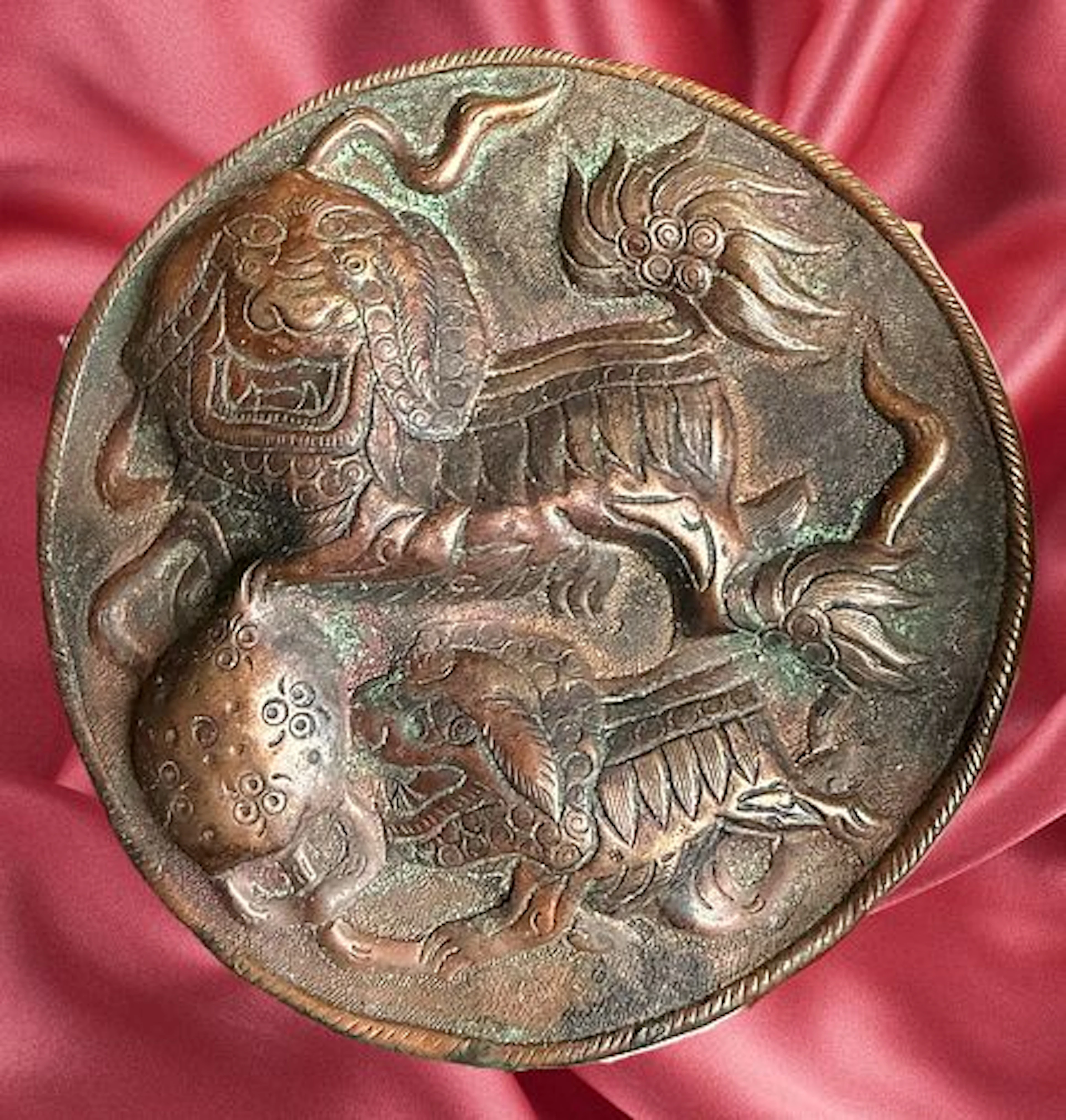 A DIVISION ONE REPOUSSE COPPER BUTTON