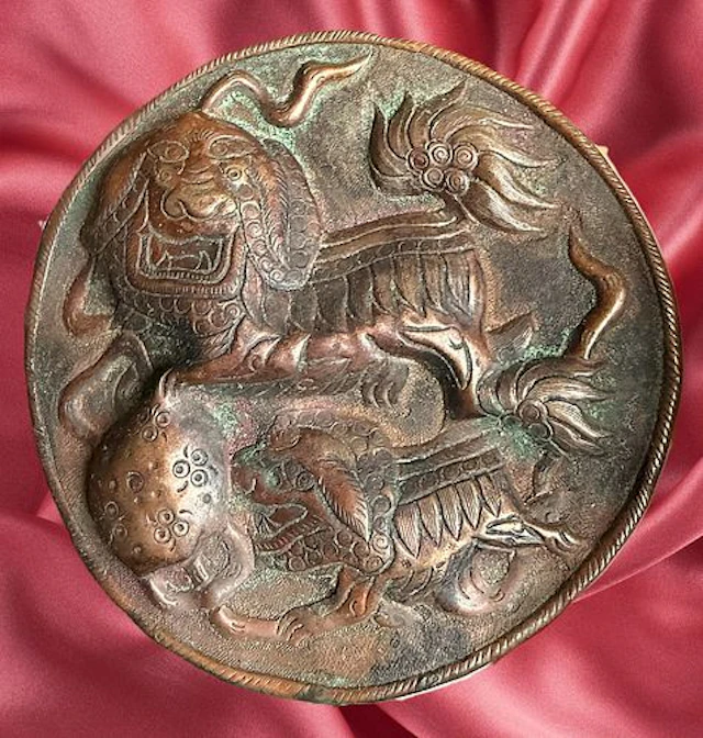 A DIVISION ONE REPOUSSE COPPER BUTTON