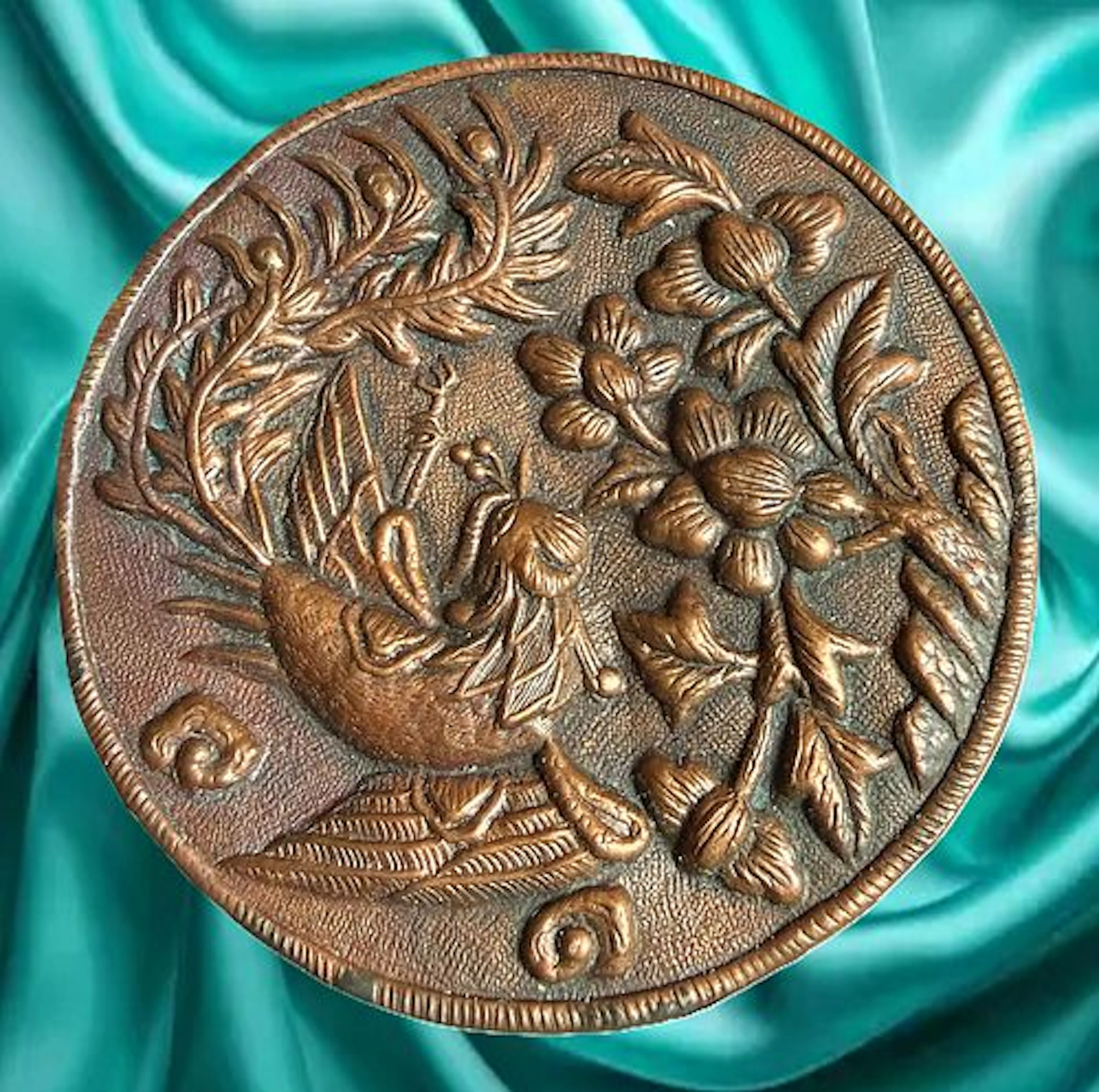 A DIVISION ONE REPOUSSE COPPER BUTTON
