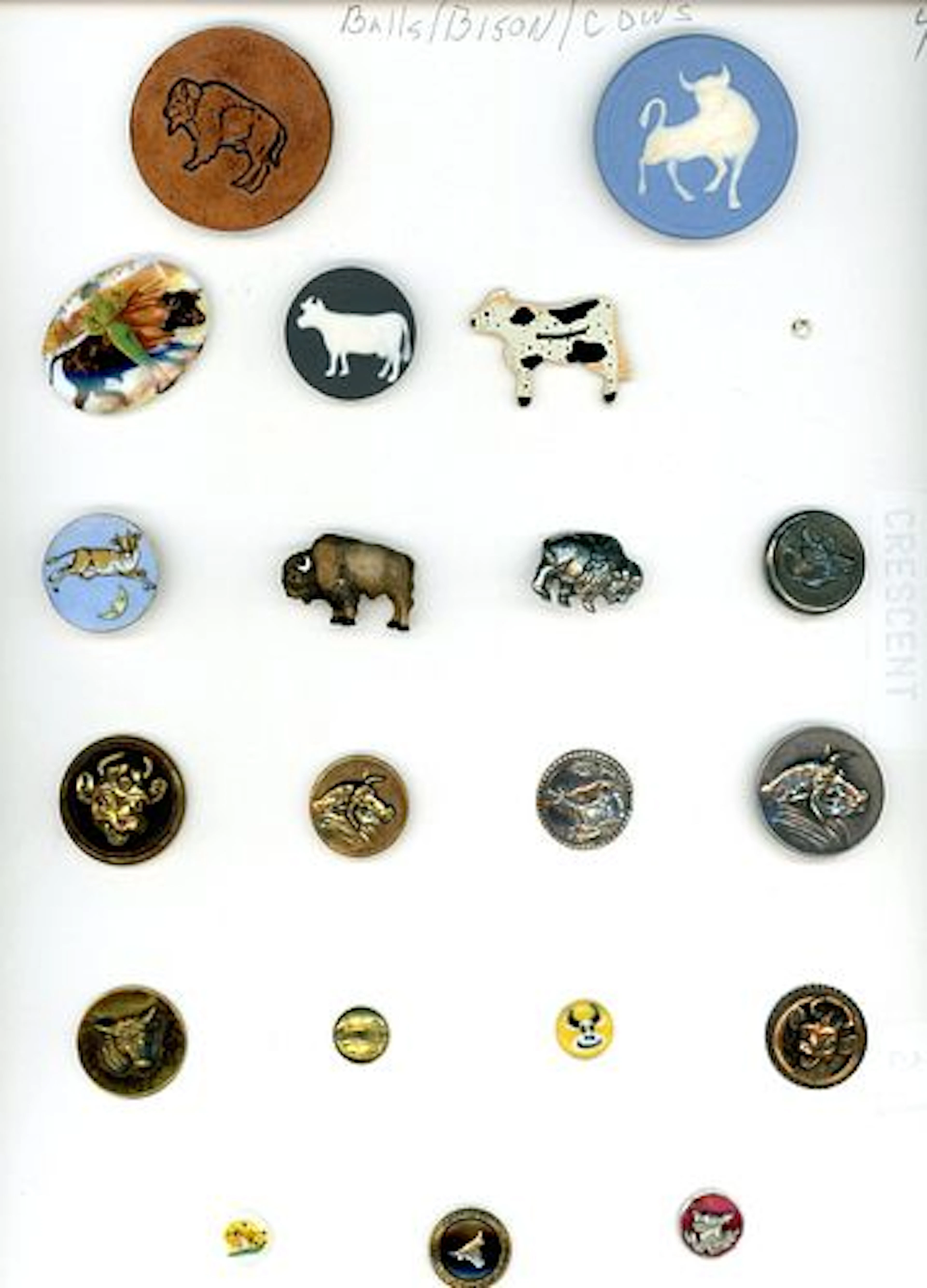 A CARD OF DIVISION ONE AND THREE BULLS AND COW BUTTONS