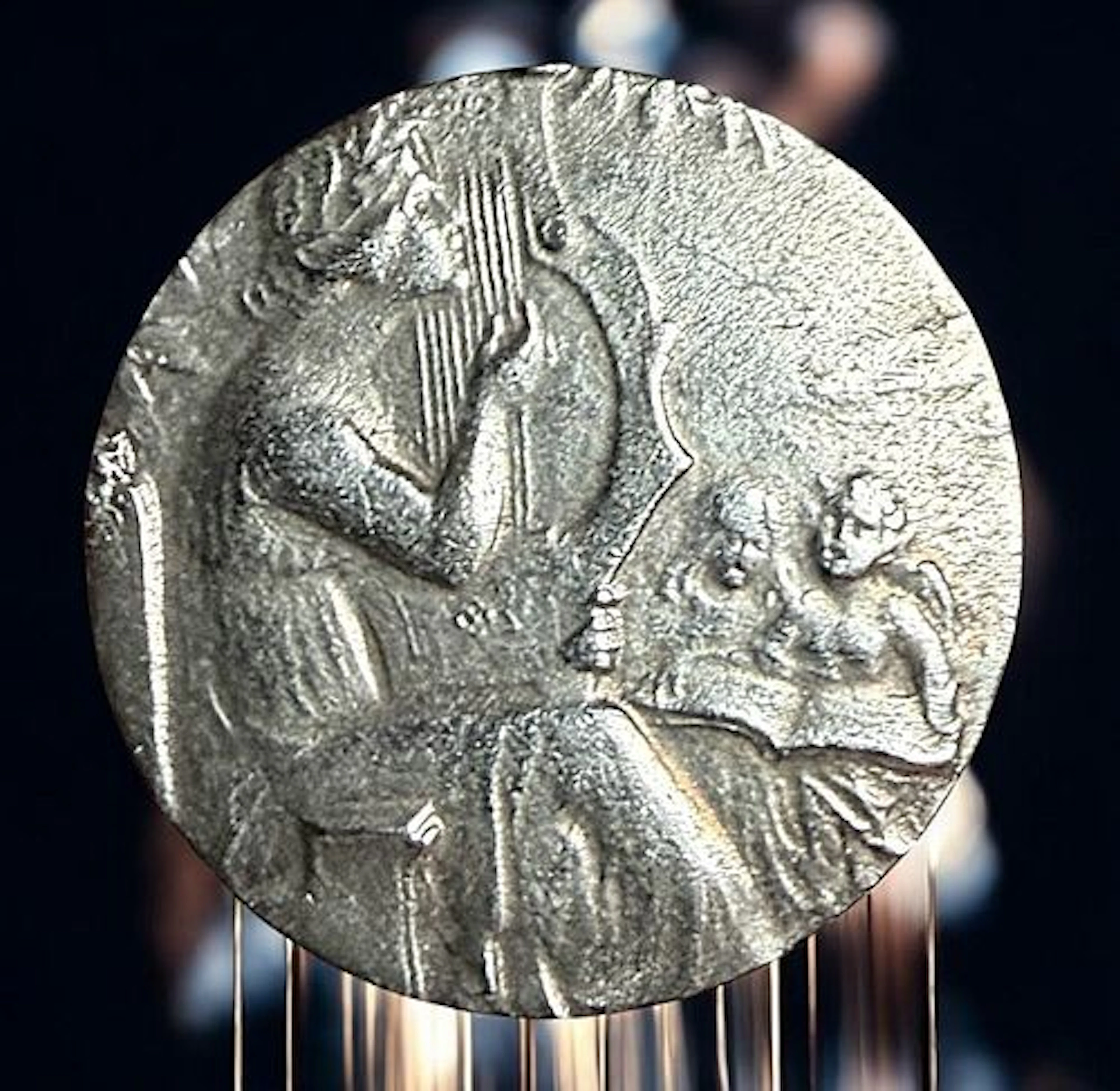 A DIVISION ONE THIRD AVENUE SILVER BUTTON