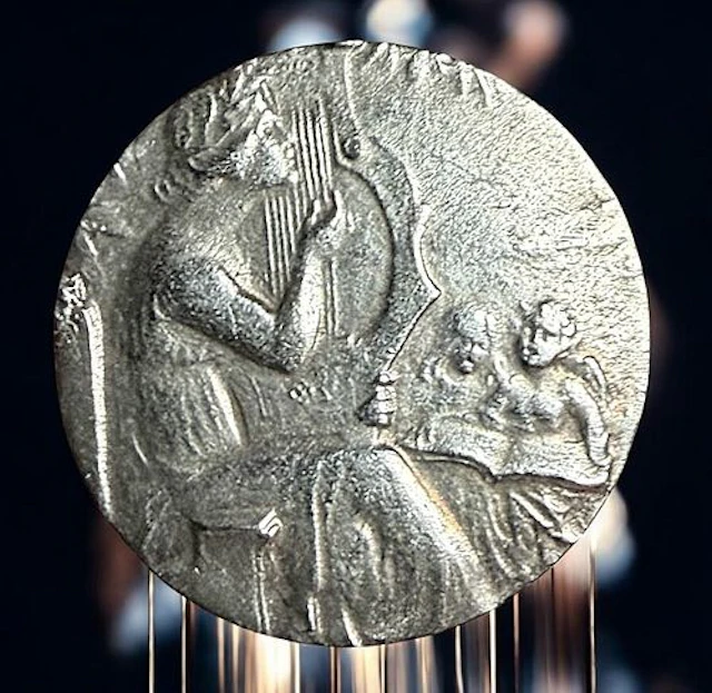 A DIVISION ONE THIRD AVENUE SILVER BUTTON