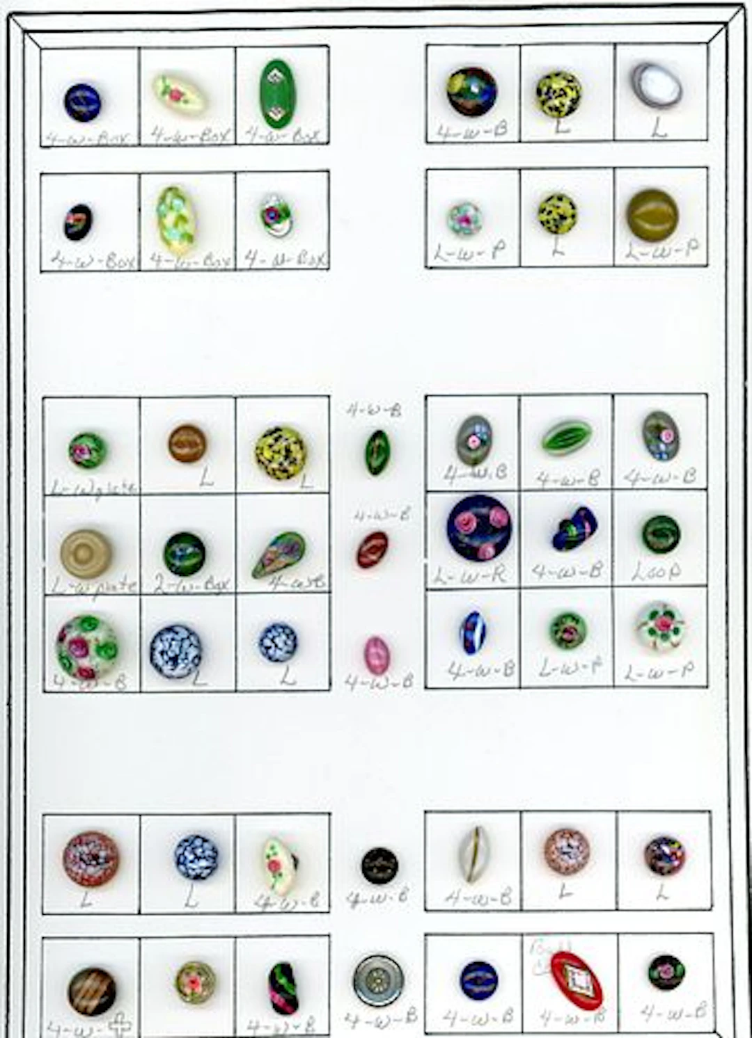 A CARD OF DIVISION ONE EYE CANDY GLASS BUTTONS